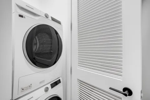a view of washer and dryer in a utility room