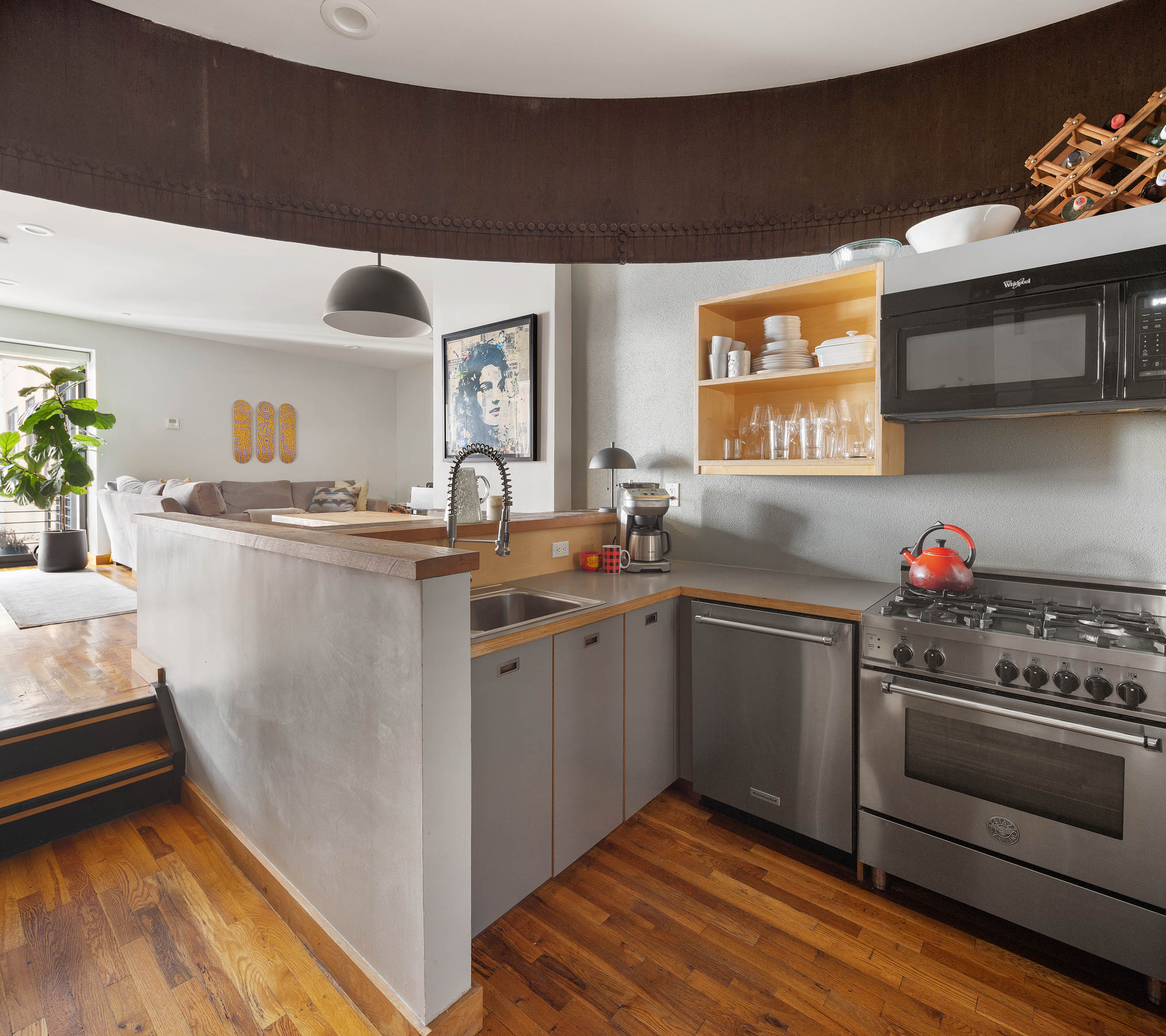37 Bridge Street, Unit 3G Brooklyn, NY 11201 - Photo 2 of 11 a kitchen with granite countertop a sink and cabinets