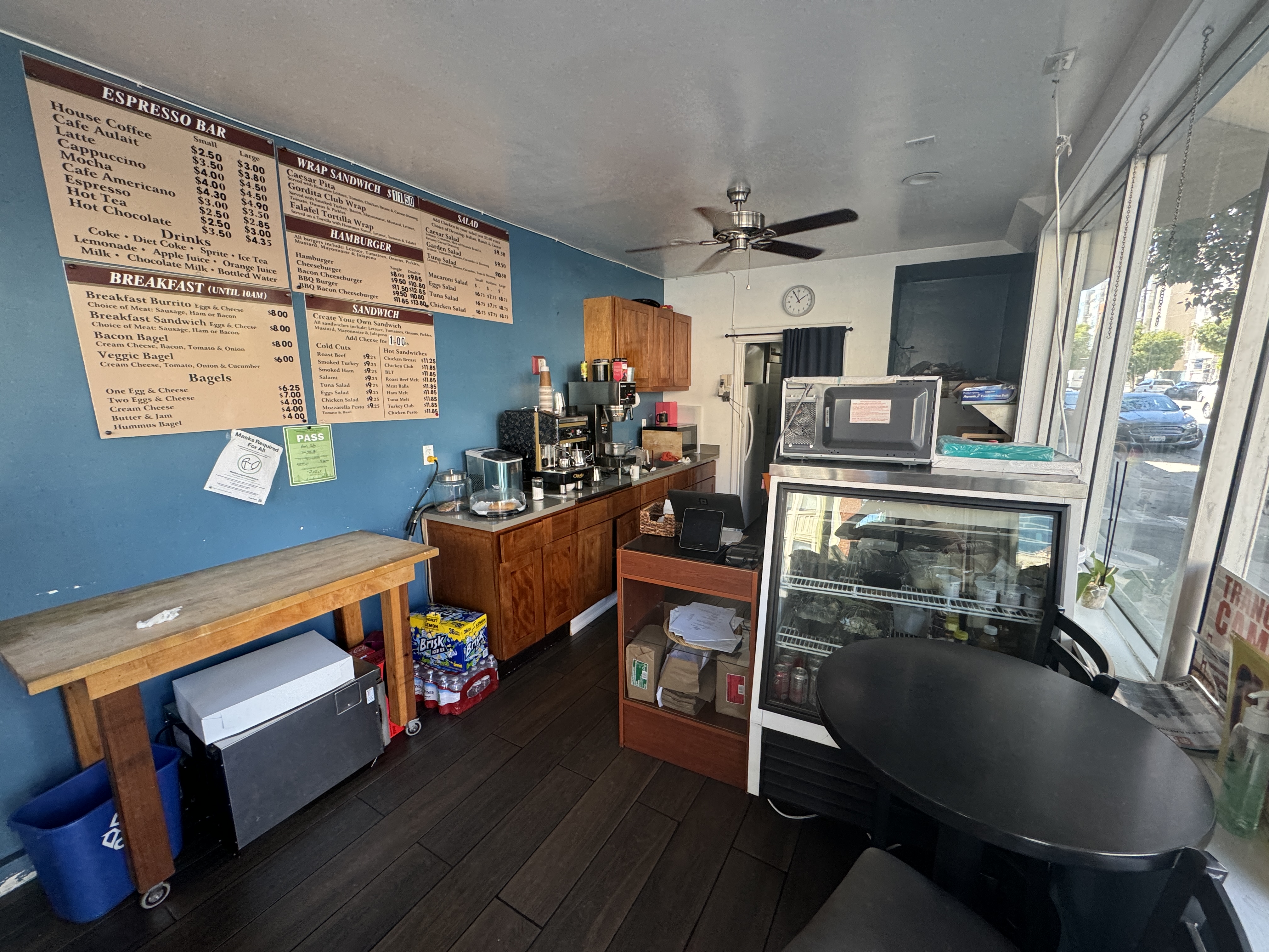 201 Fell Street San Francisco, CA 94102 - Photo 20 of 30 a living room with furniture a flat screen tv and a fireplace