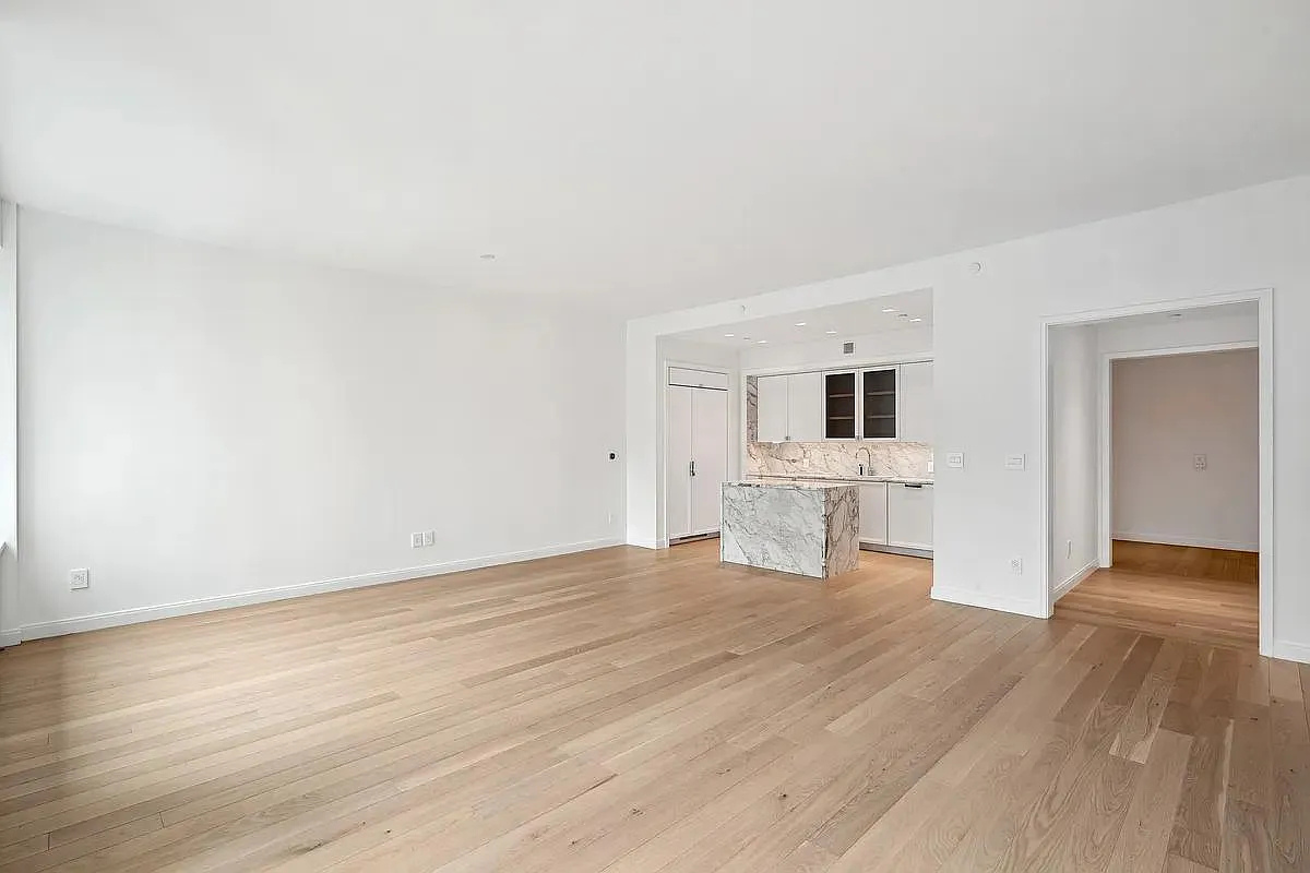 269 West 87th Street, Unit 9B Manhattan, NY 10024 - Photo 2 of 23 a view of a kitchen with wooden floor and electronic appliances