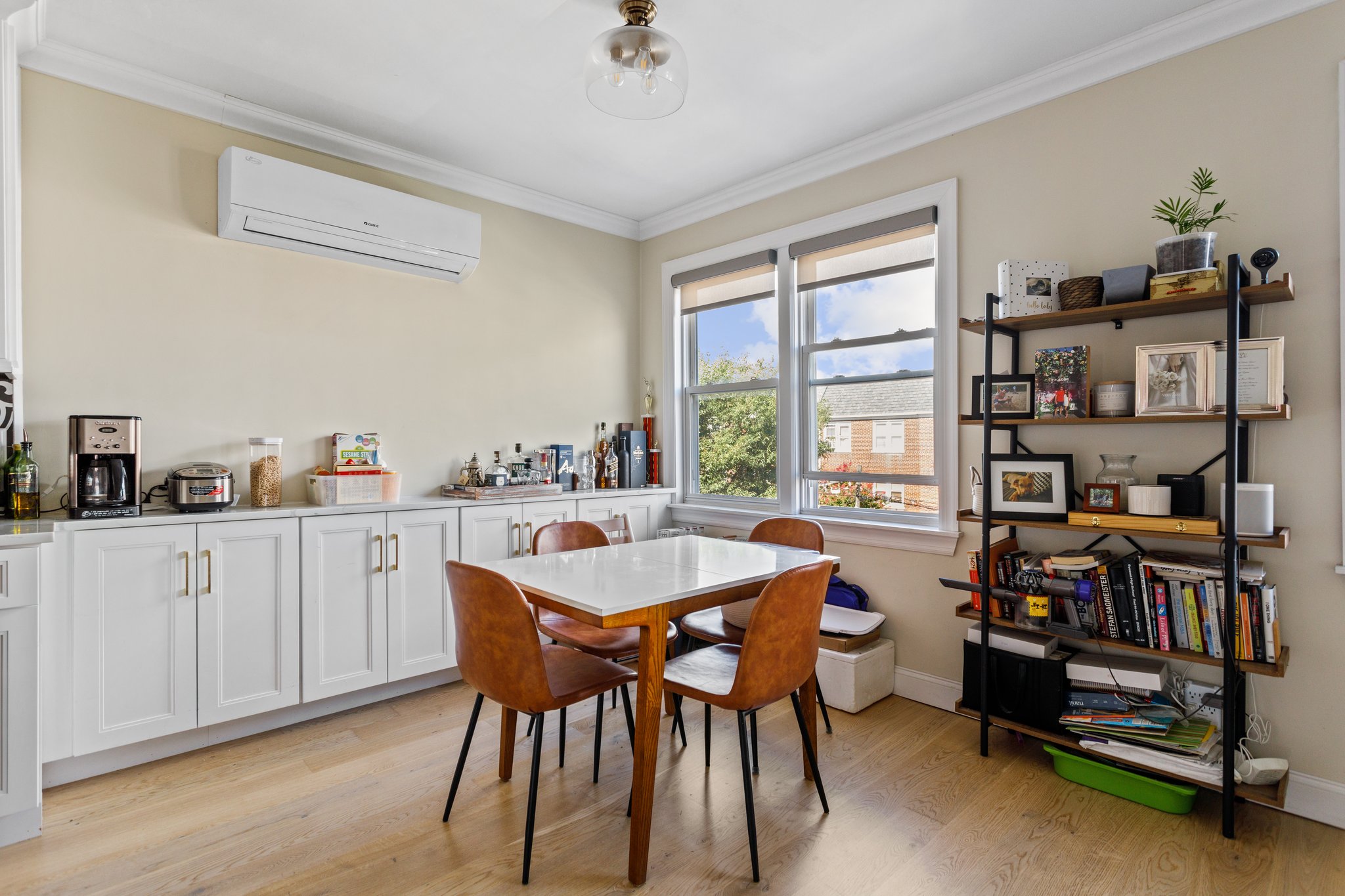 22-45 47th Street, Unit 3 Queens, NY 11105 - Photo 4 of 14 a dining room with furniture and window