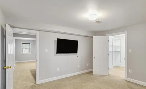 a view of a room with an empty space