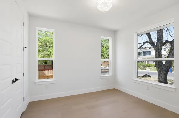 an empty room with windows