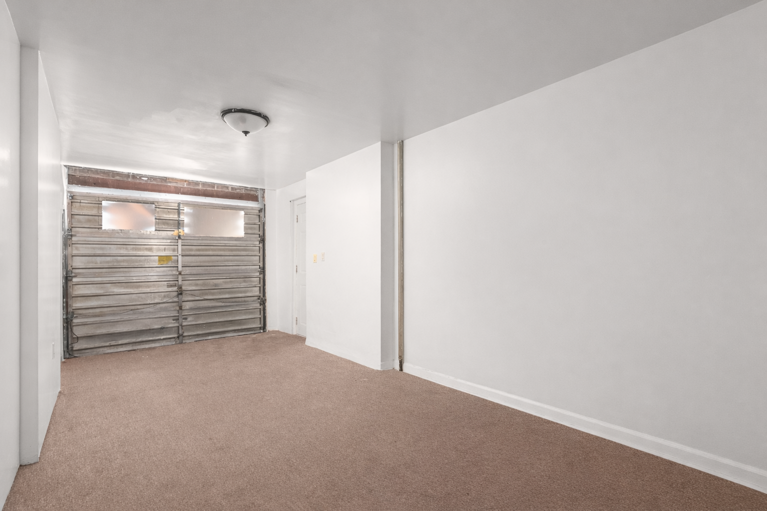 1268 East 52nd Street Brooklyn, NY 11234 - Photo 9 of 13 a view of an empty room