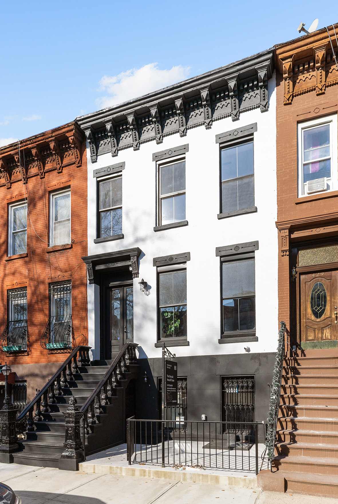 427 Quincy Street Brooklyn, NY 11221 - Photo 10 of 12 a front view of a house with glass windows