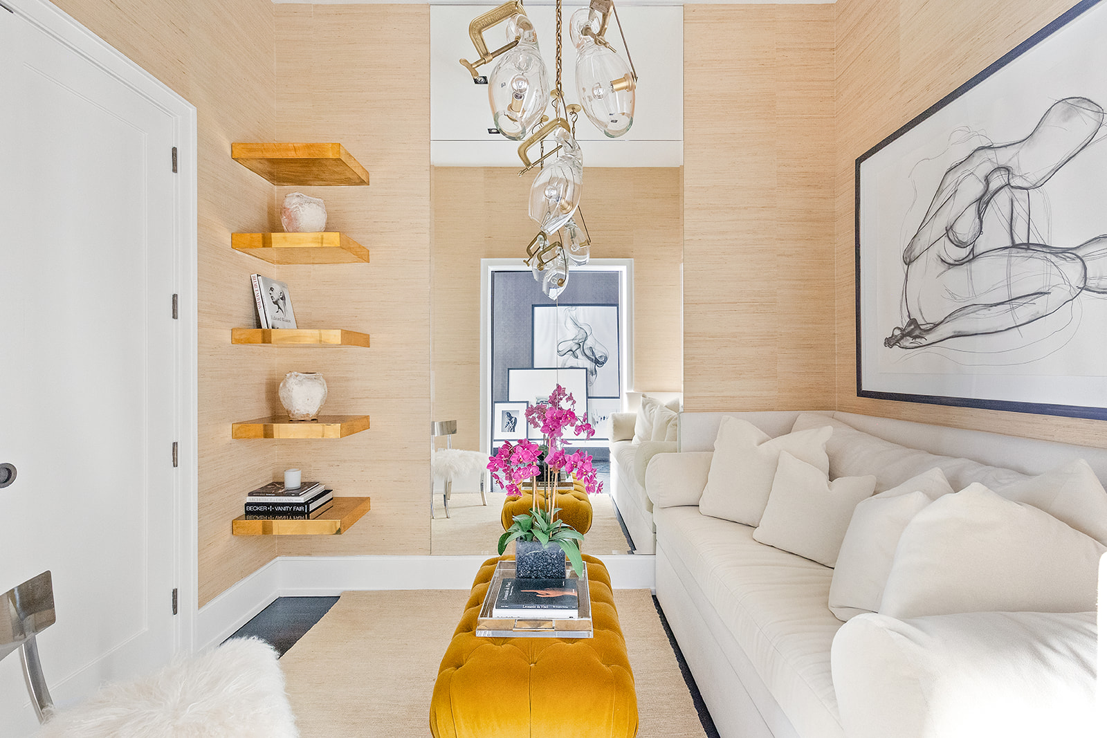 212 West 18th Street, Unit 12E Manhattan, NY 10011 - Photo 7 of 13 a living room with furniture and flowers