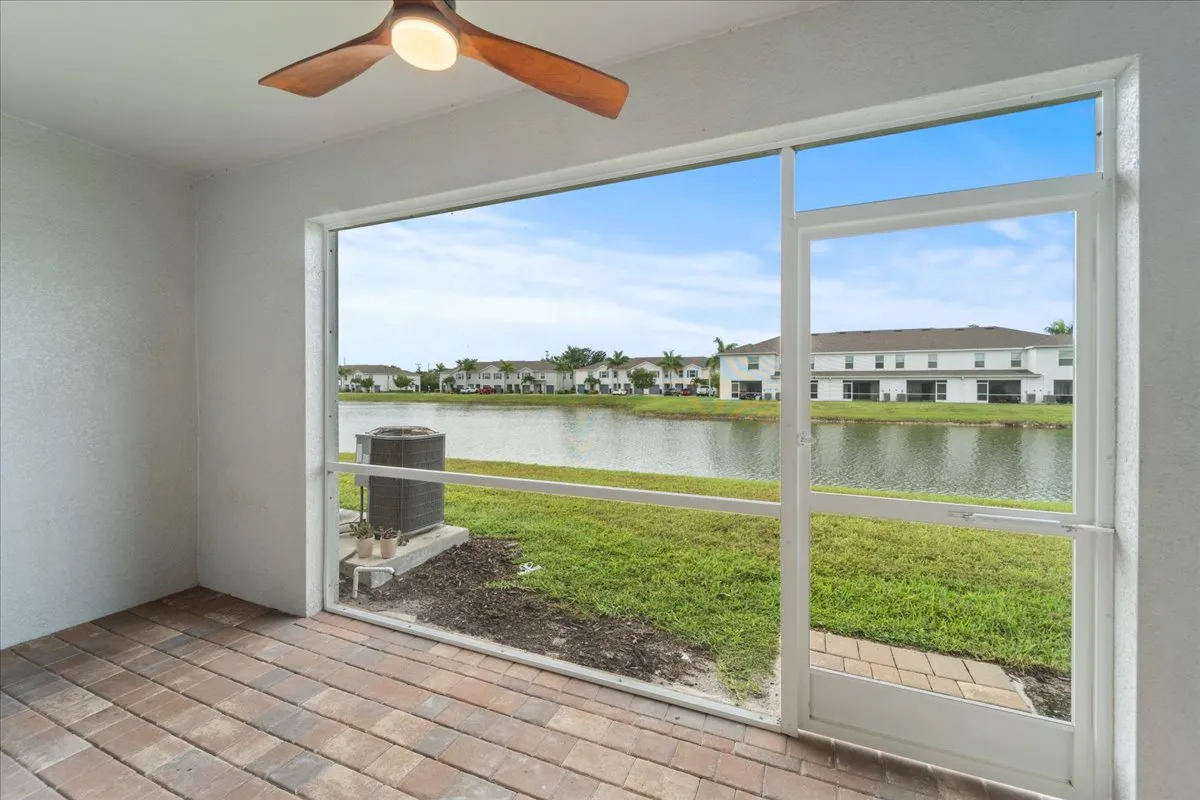 a view of a swimming pool with a lounge chairs
