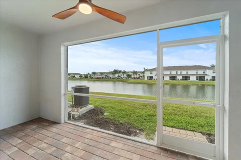a view of a swimming pool with a lounge chairs