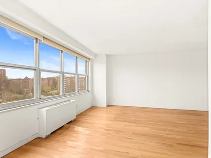 a view of an empty room with a window