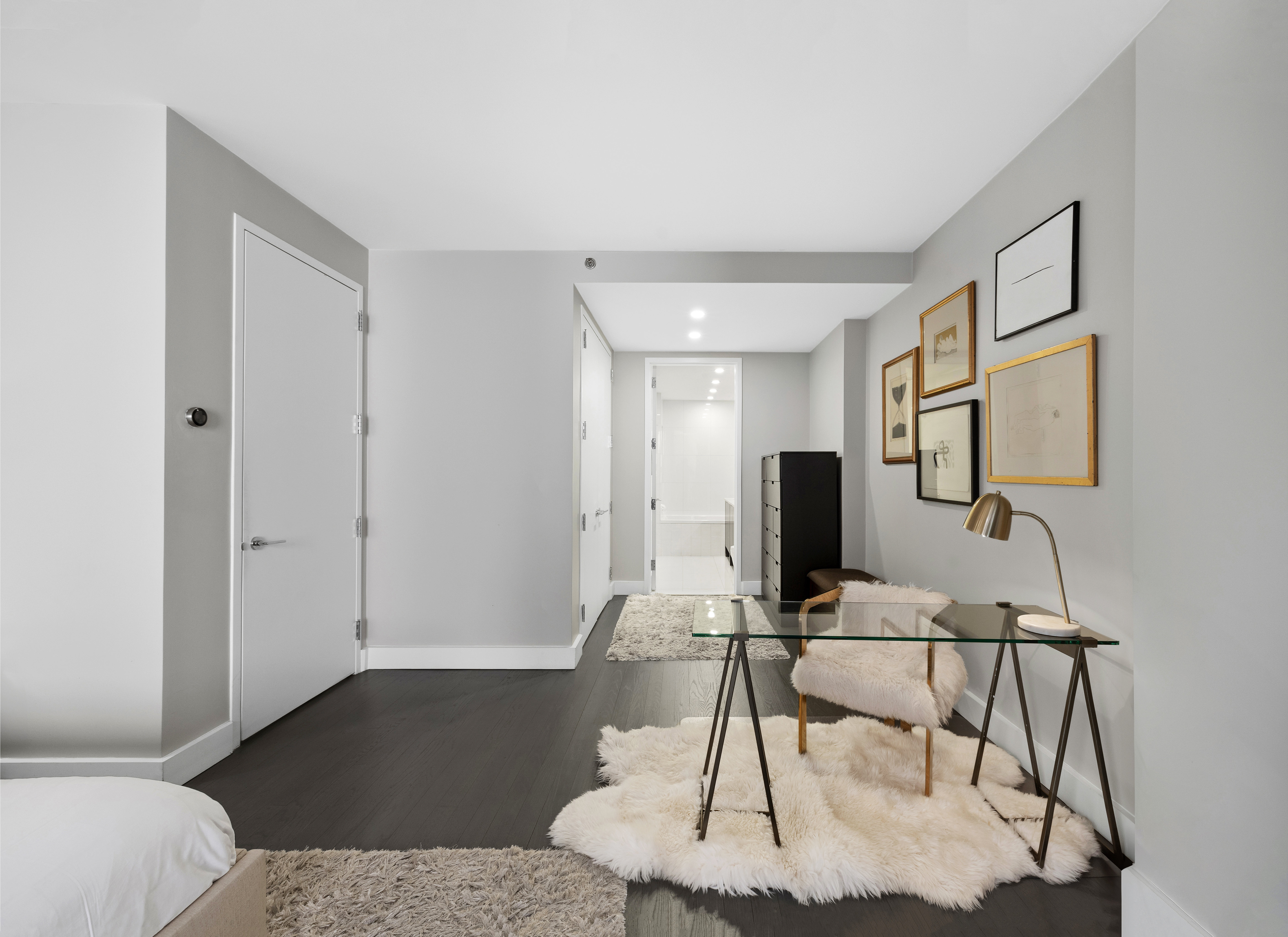 129 West 123rd Street, Unit 3 Manhattan, NY 10027 - Photo 9 of 20 a living room with a couch and a potted plant