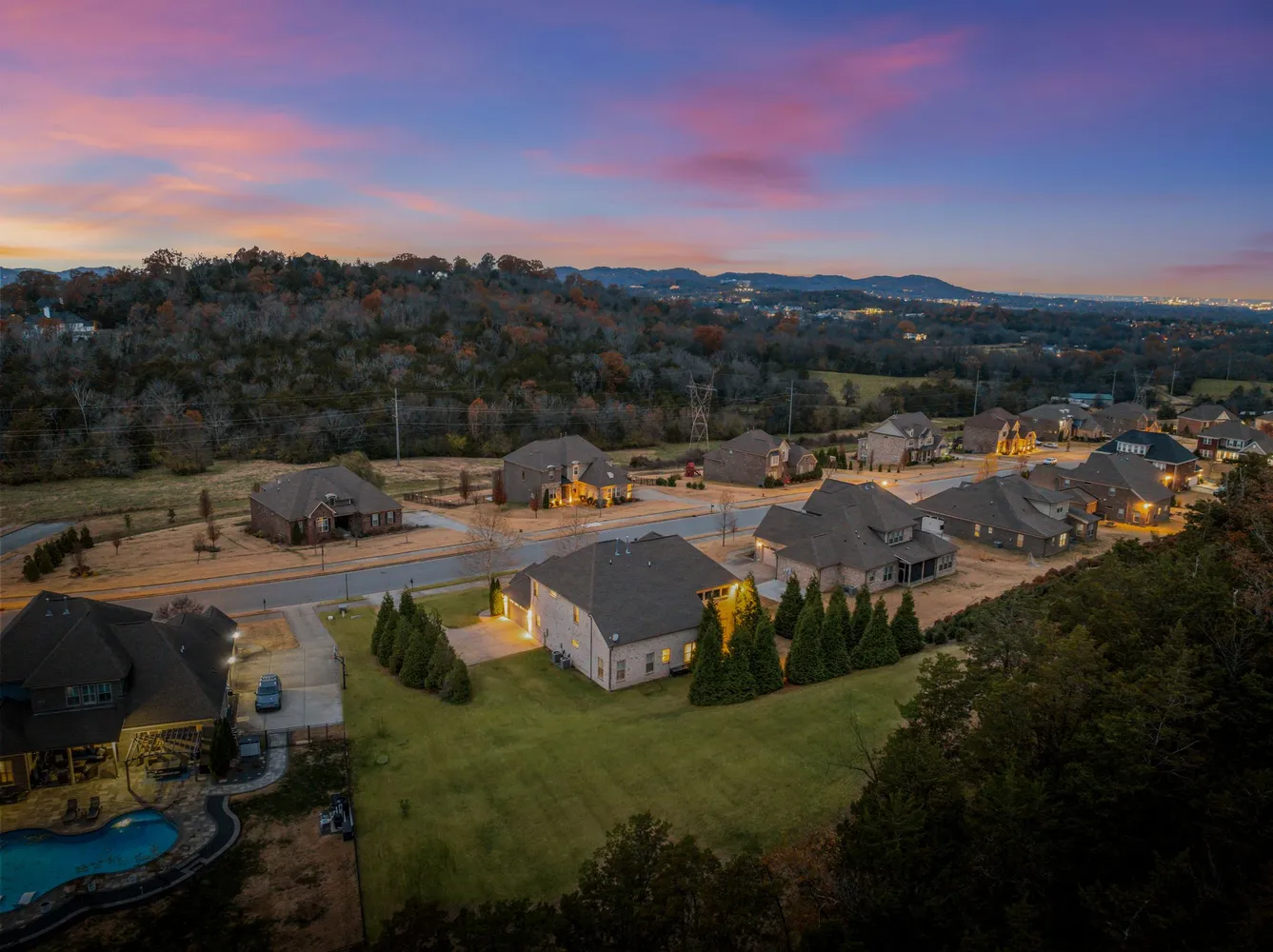 a view of a town with mountains in the background