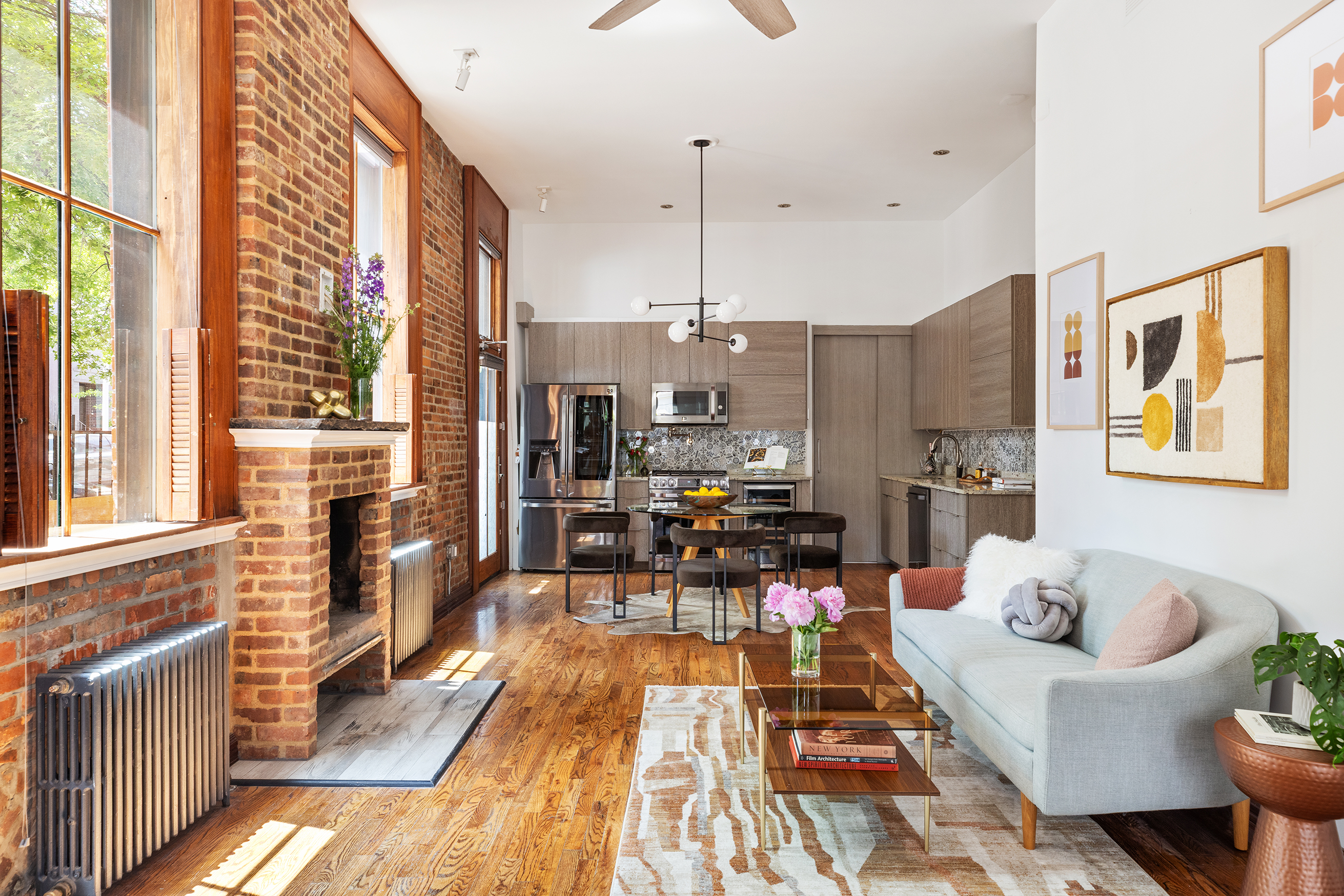 412 Classon Avenue Brooklyn, NY 11238 - Photo 3 of 30 a living room with furniture and large windows