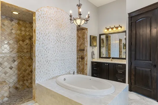 a bathroom with a sink and mirror