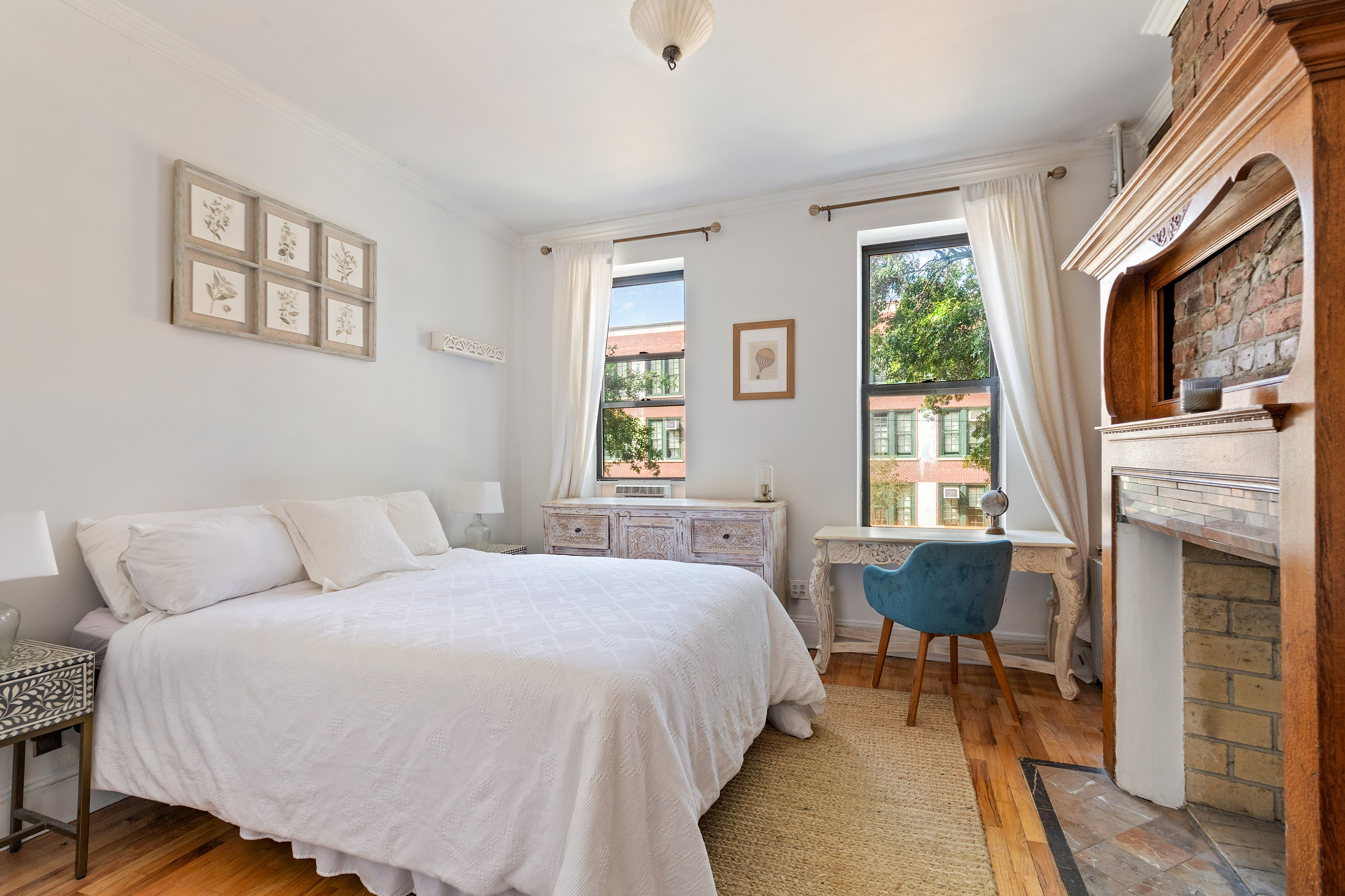 347 5th Avenue, Unit 2L Brooklyn, NY 11215 - Photo 3 of 5 a bed room with a bed and a chair