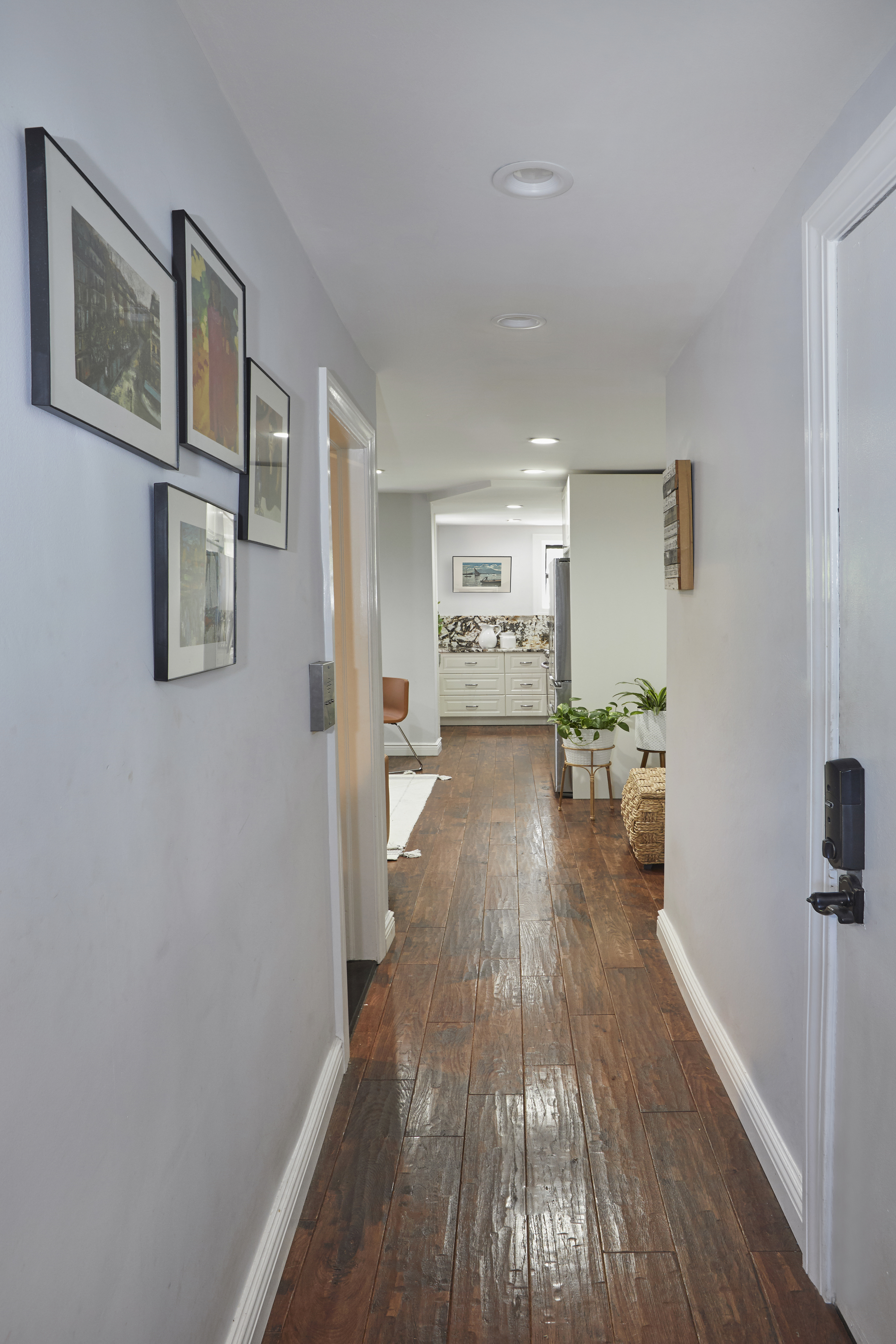 443 Hicks Street, Unit 3E Brooklyn, NY 11201 - Photo 6 of 7 a view of a hallway with wooden floor and furniture