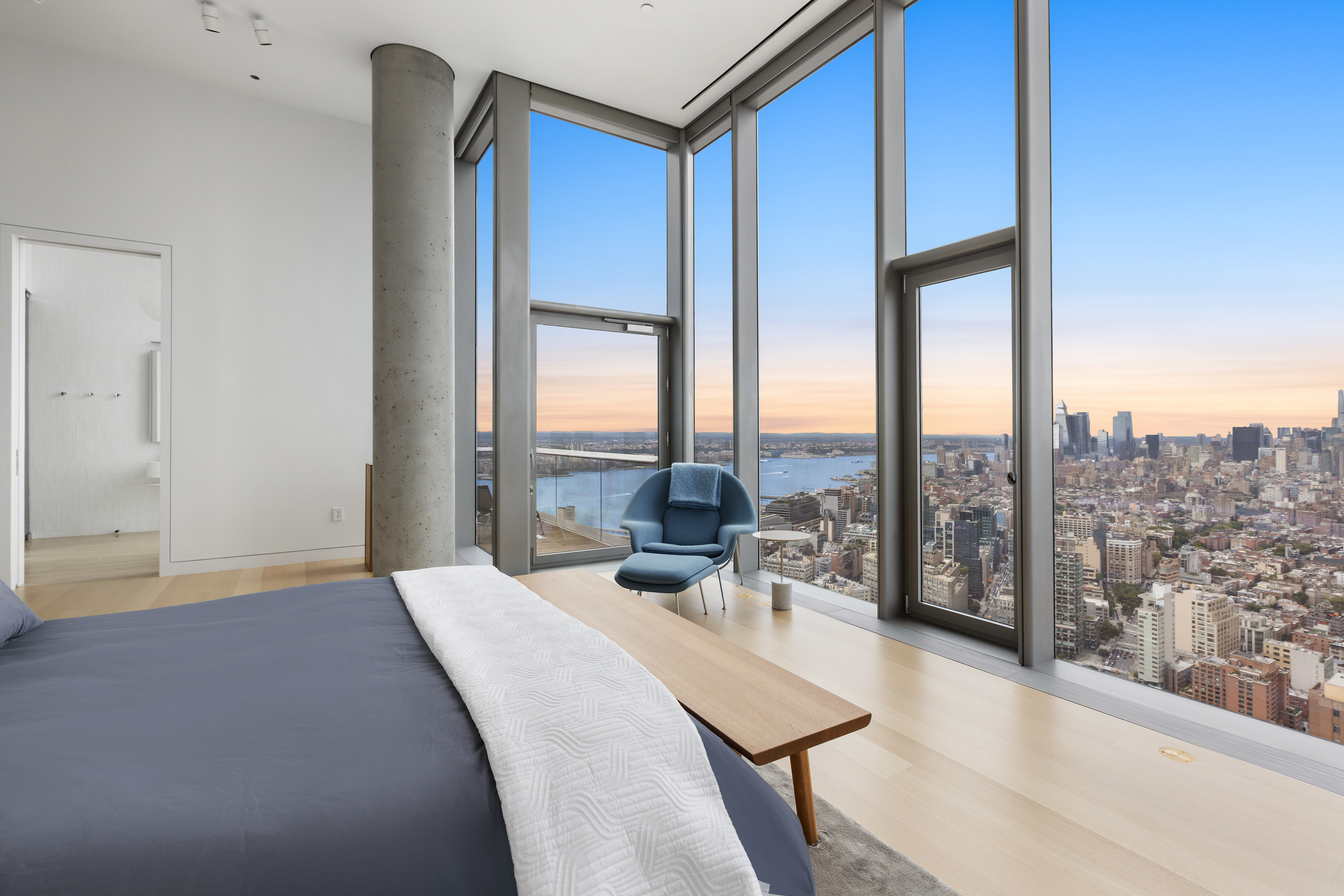 56 Leonard Street, Unit PH52A Manhattan, NY 10013 - Photo 11 of 24 a view of living room with furniture and floor to ceiling window