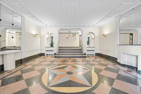 a view of a living room and bathroom