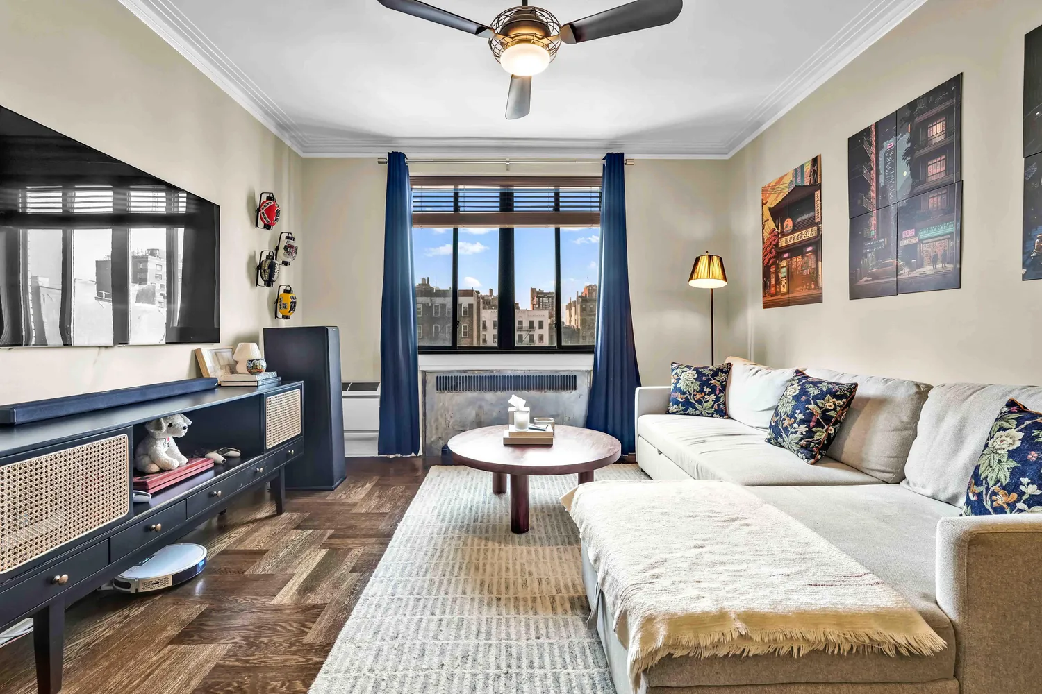 a living room with furniture and a window