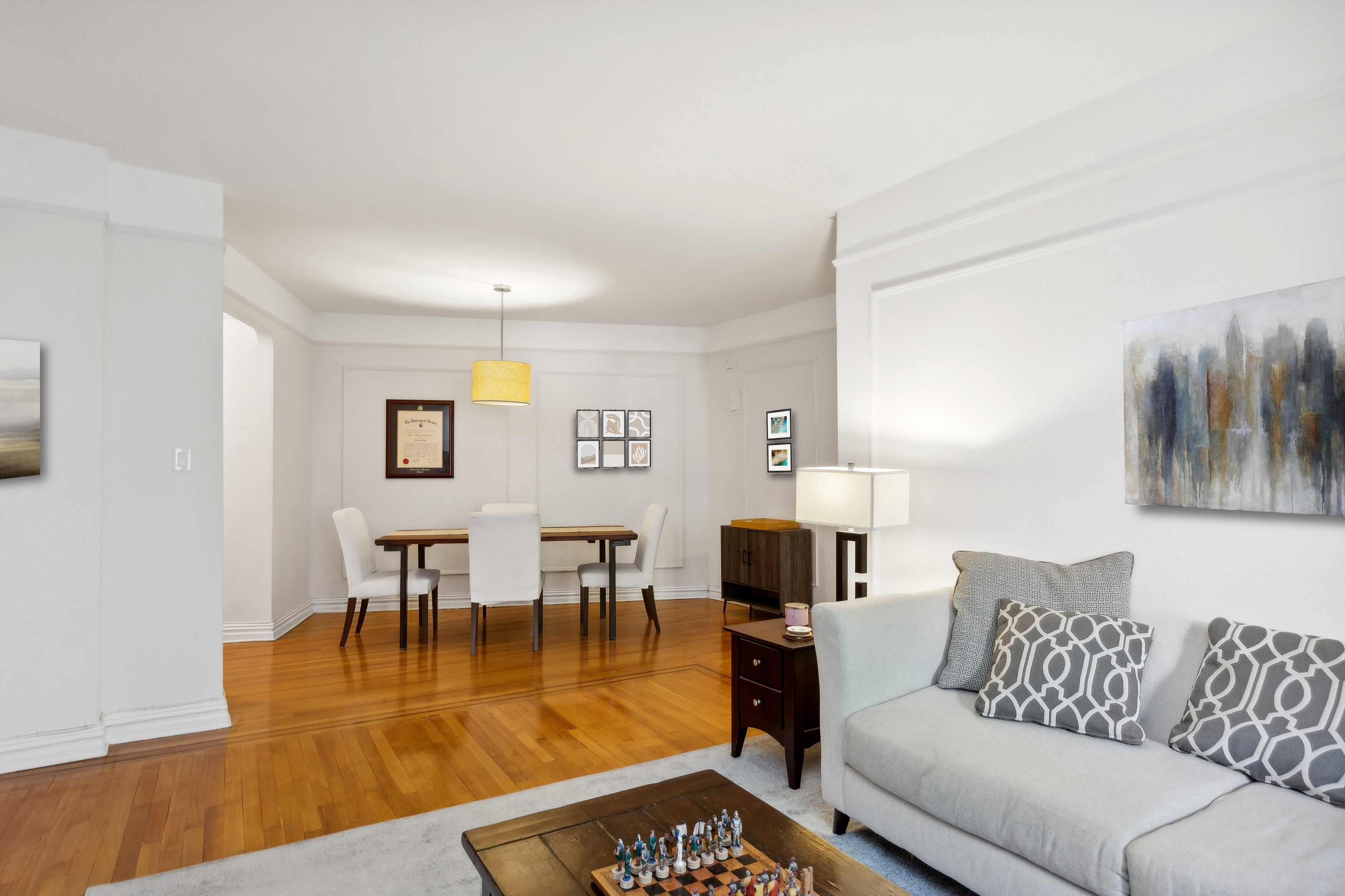 736 West 186th Street, Unit 5B Manhattan, NY 10033 - Photo 2 of 16 a living room with furniture wooden floor and a table