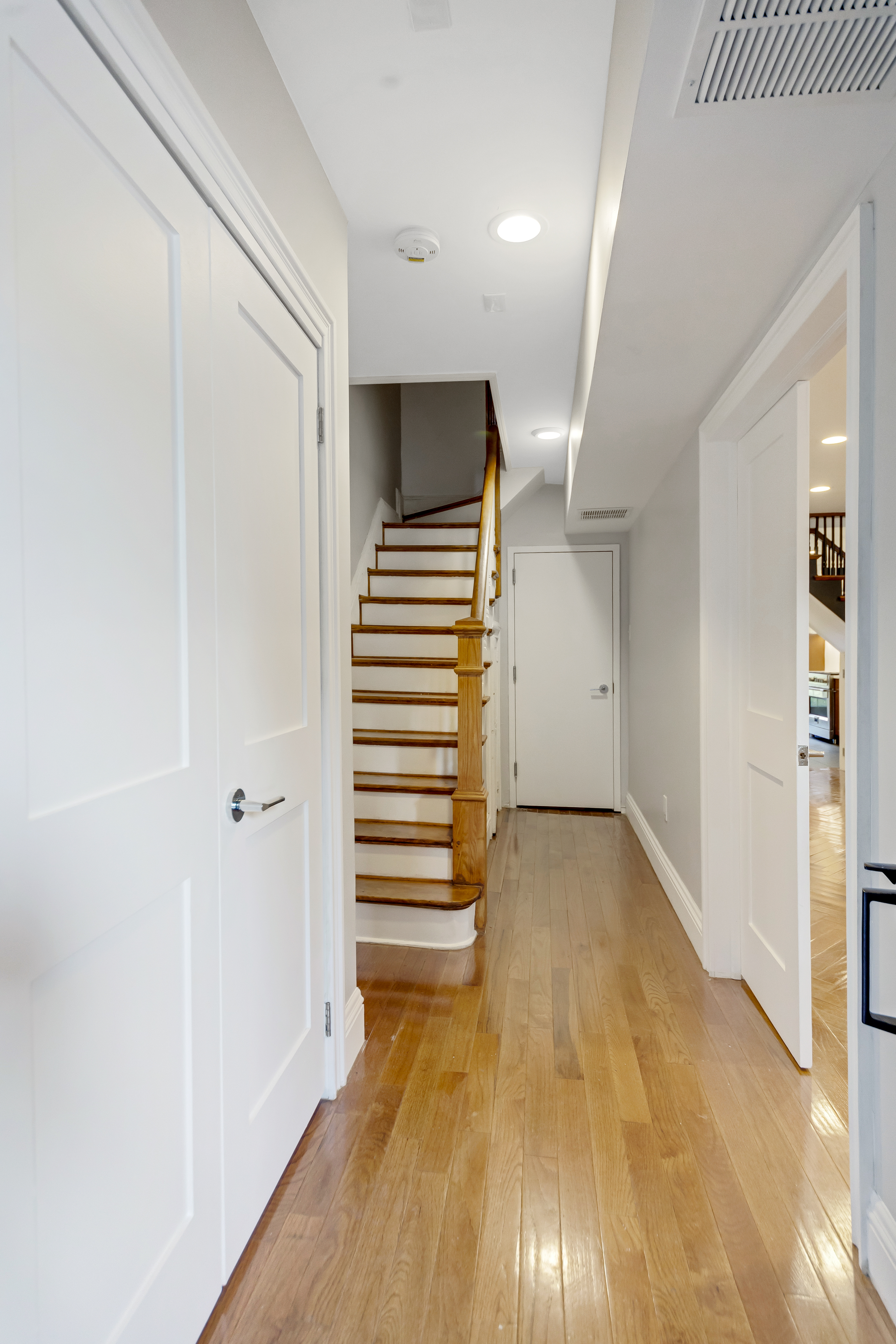 57 Hendrix Street, Unit 1 Brooklyn, NY 11207 - Photo 3 of 12 a view of entryway and hall with wooden floor