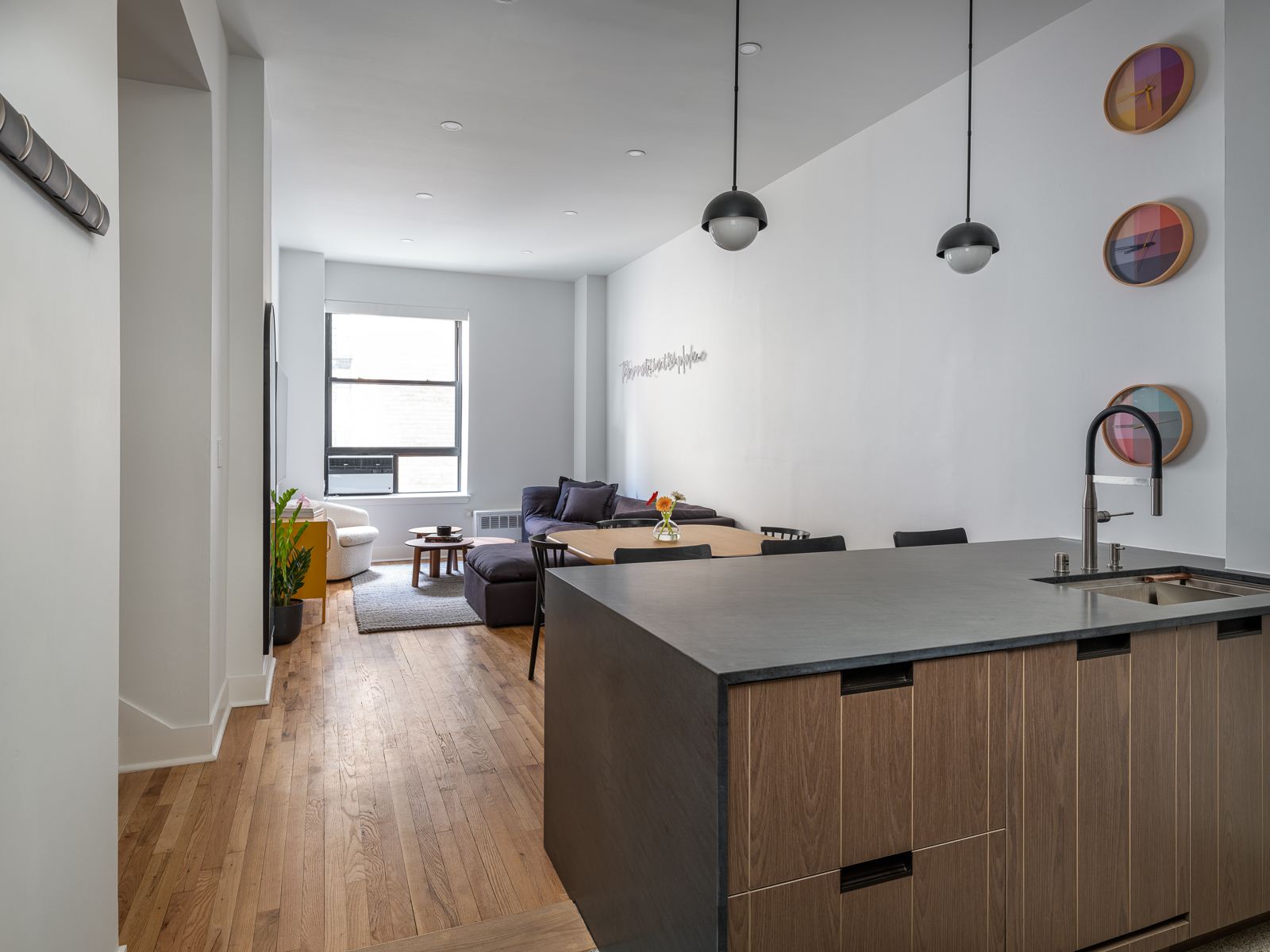 23 East 10th Street, Unit 404 Manhattan, NY 10003 - Photo 5 of 11 a kitchen with a sink and appliances