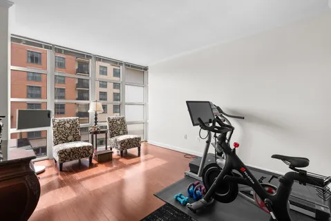 a view of a hallway with washer and dryer