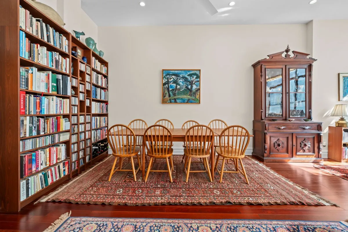 a view of a chairs and table in a patio