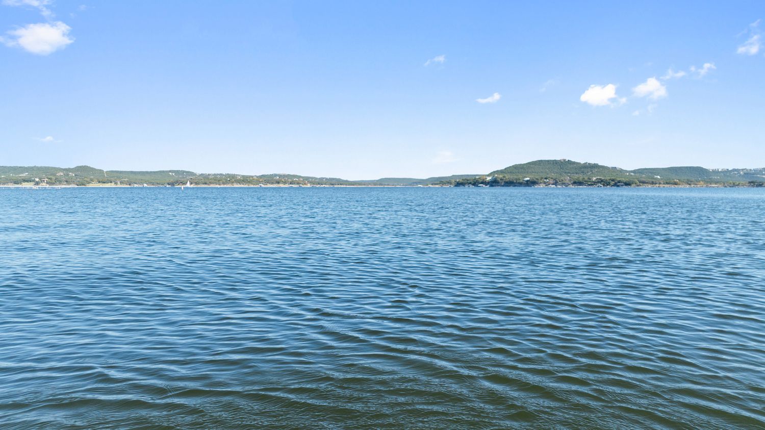 a kitchen with stainless steel appliances granite countertop a sink and a stove