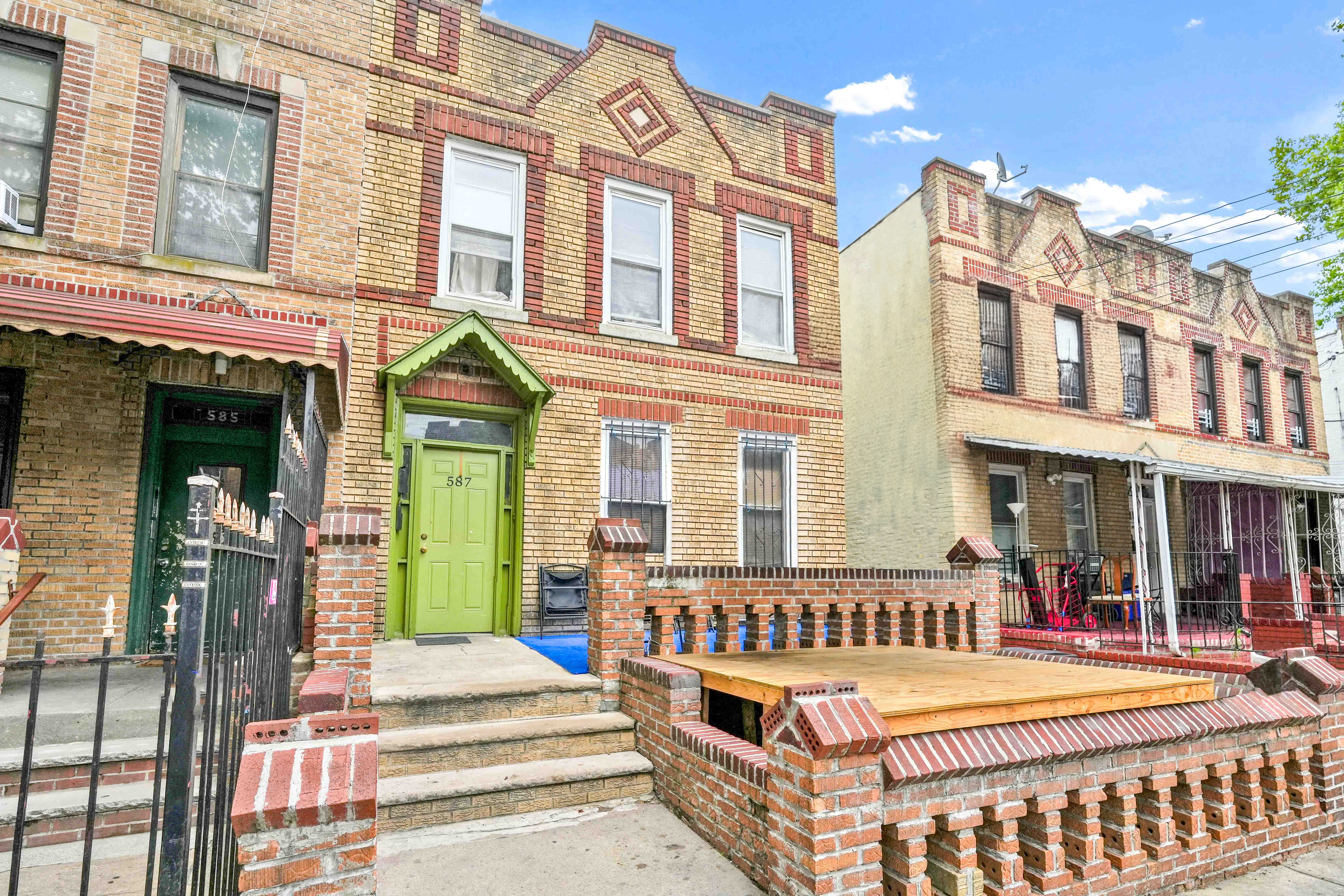 587 Osborn Street Brooklyn, NY 11212 - Photo 2 of 10 a front view of a building with street