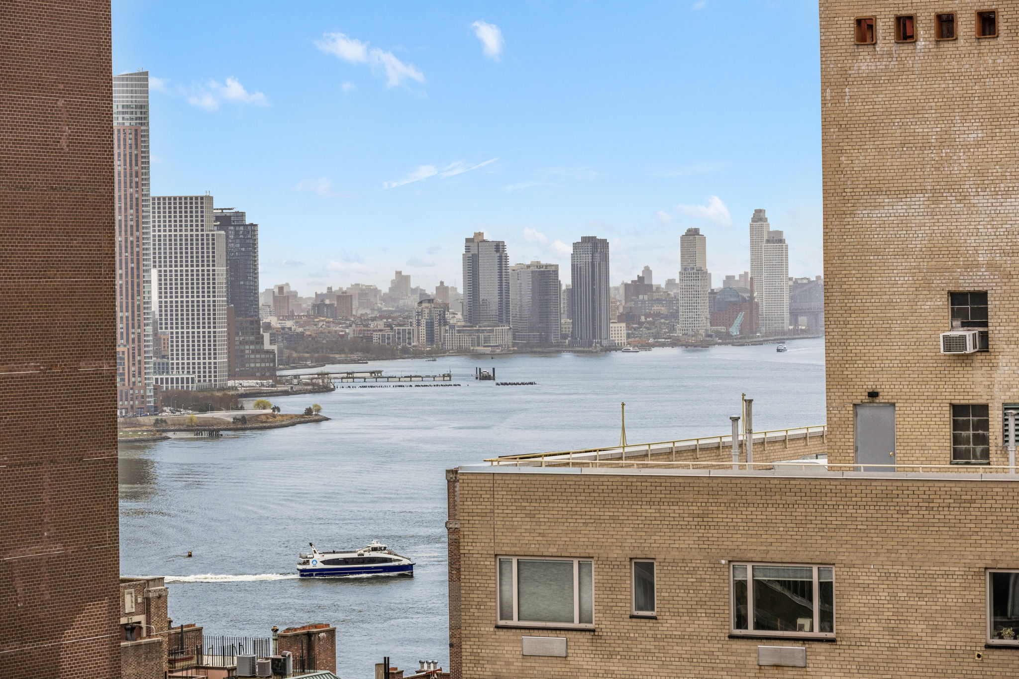 400 East 54th Street, Unit 19H Manhattan, NY 10022 - Photo 14 of 15 a view of a city with tall buildings