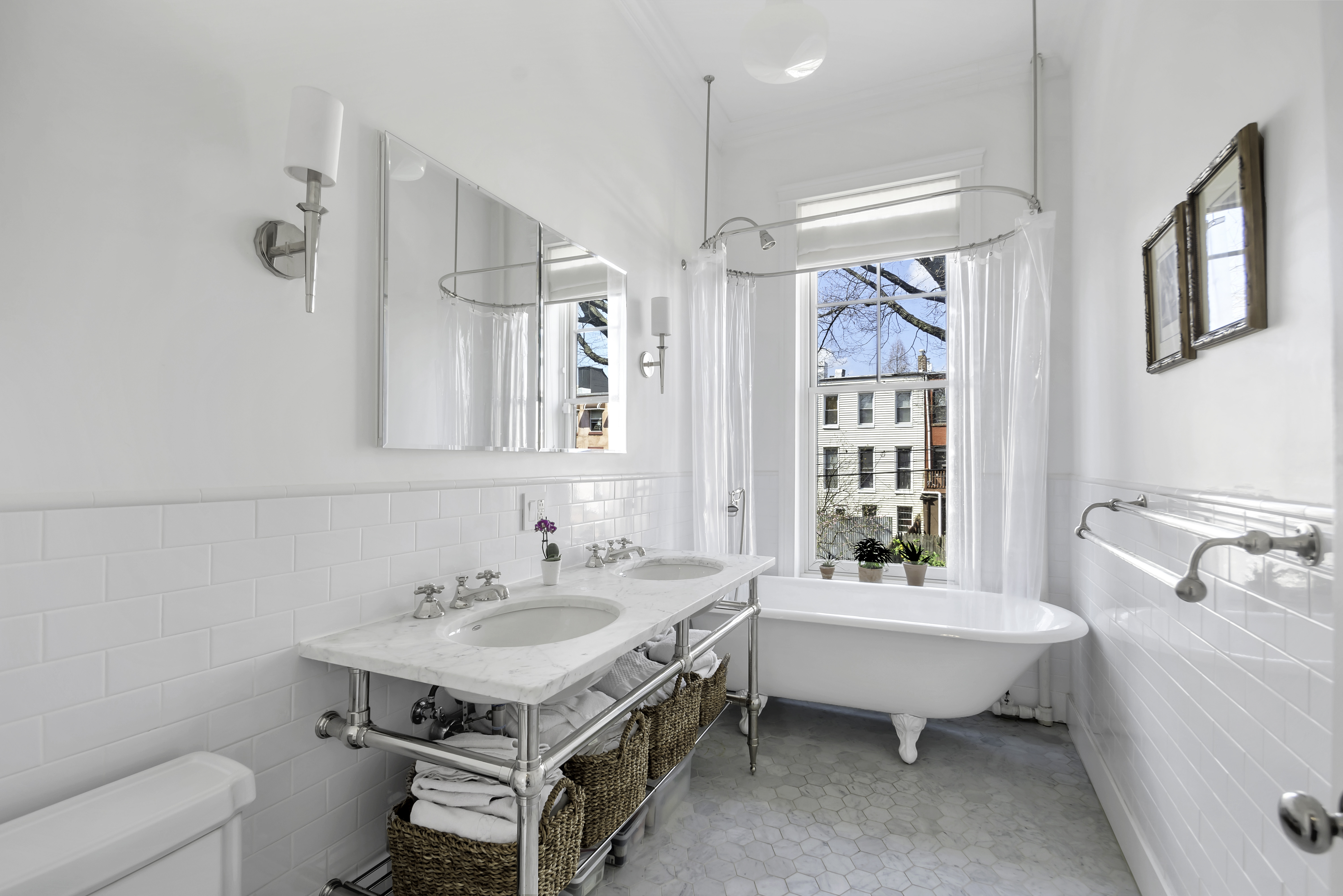 713 Greene Avenue, Unit GARDEN Brooklyn, NY 11221 - Photo 7 of 13 a spacious bathroom with a sink bathtub and a toilet