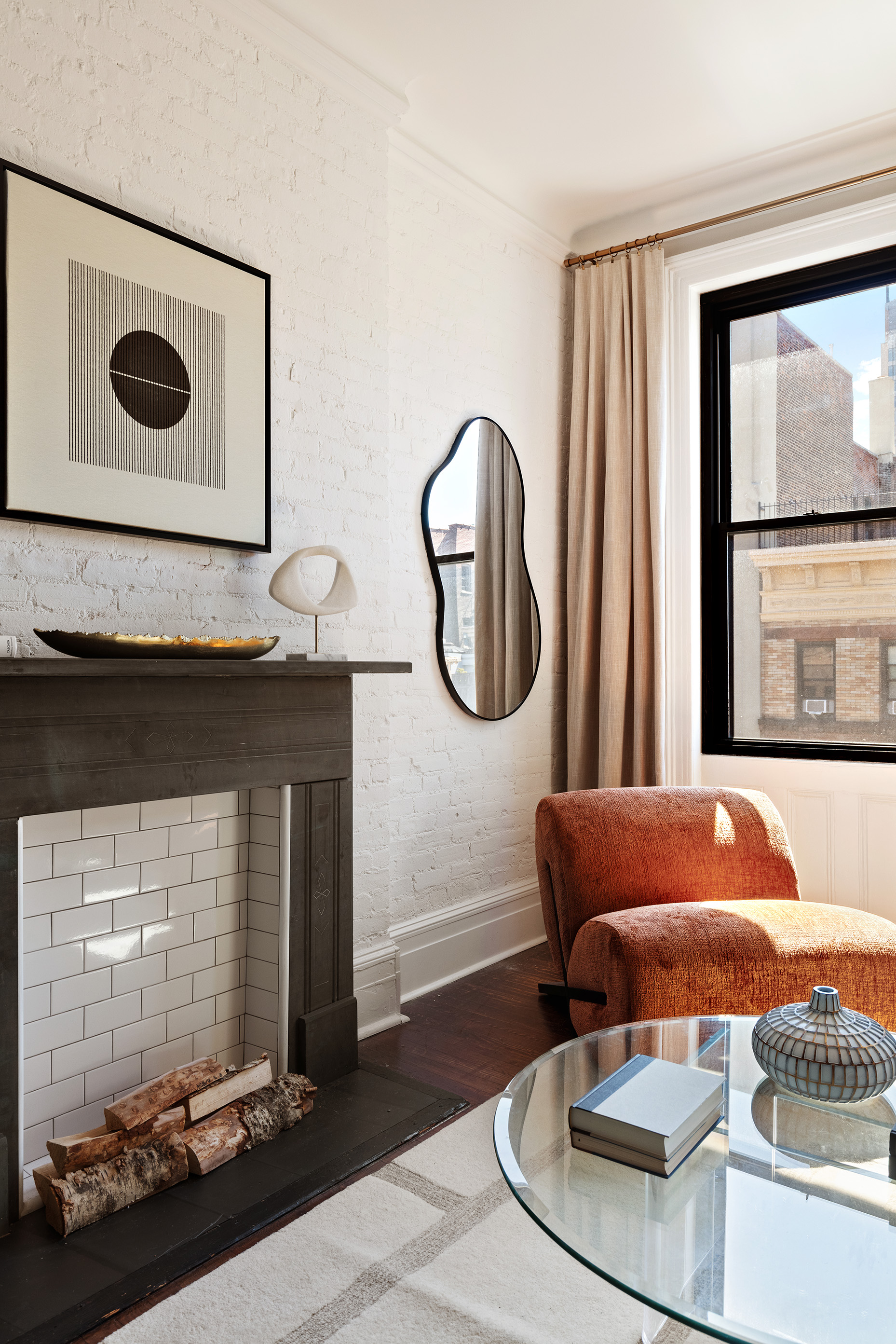223 West 21st Street, Unit PH5M Manhattan, NY 10011 - Photo 3 of 12 a living room with furniture and a painting