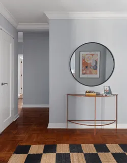 a view of a room with a black and white walls