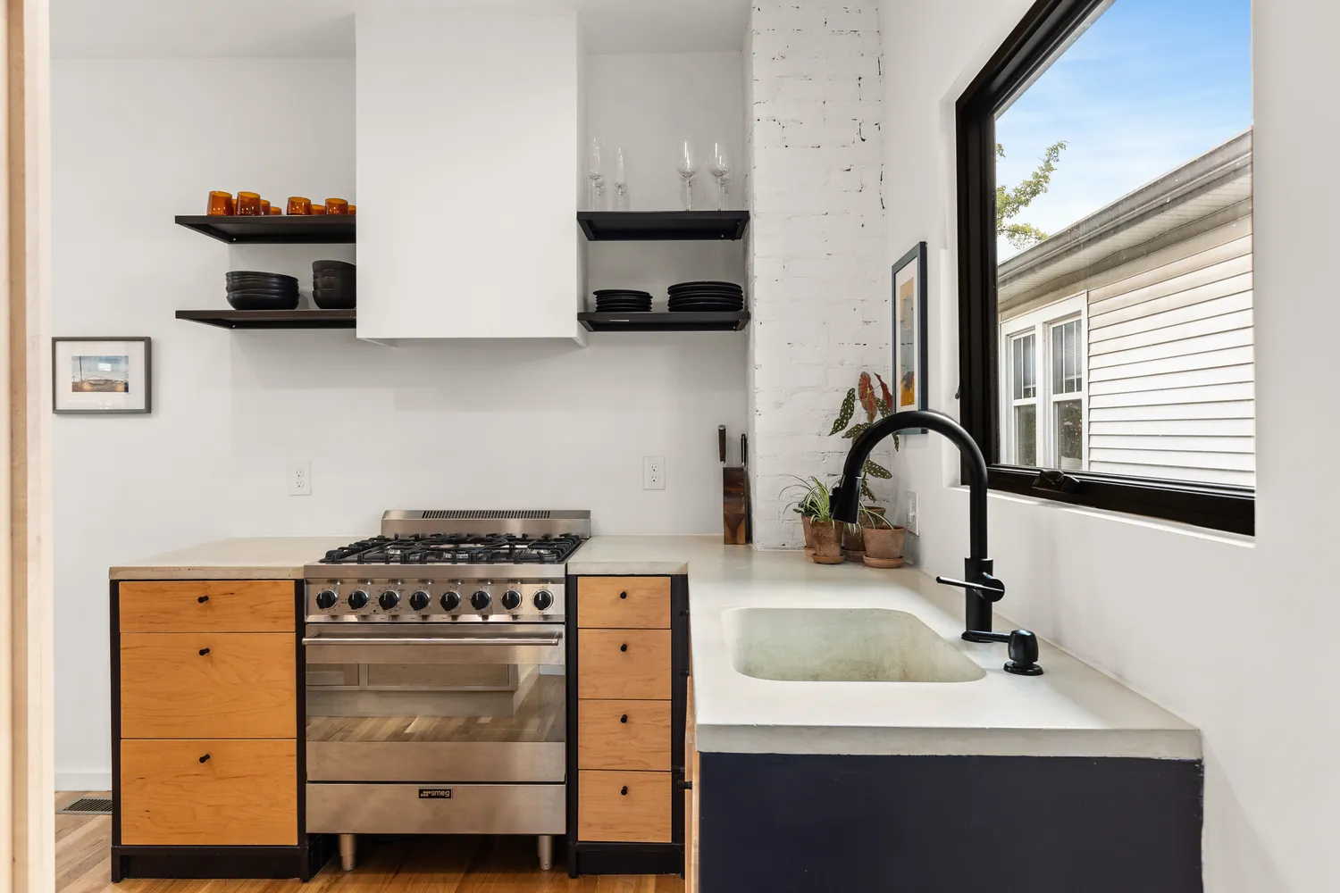a kitchen with a stove and a sink