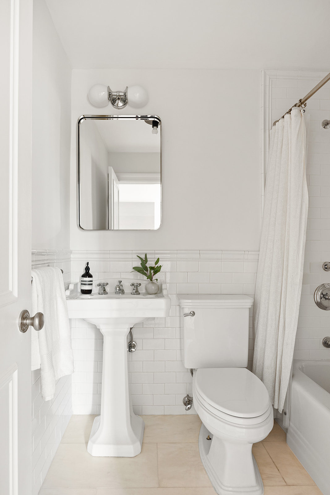 167 Clinton Street, Unit 3 Brooklyn, NY 11201 - Photo 20 of 31 a bathroom with a sink a toilet and mirror