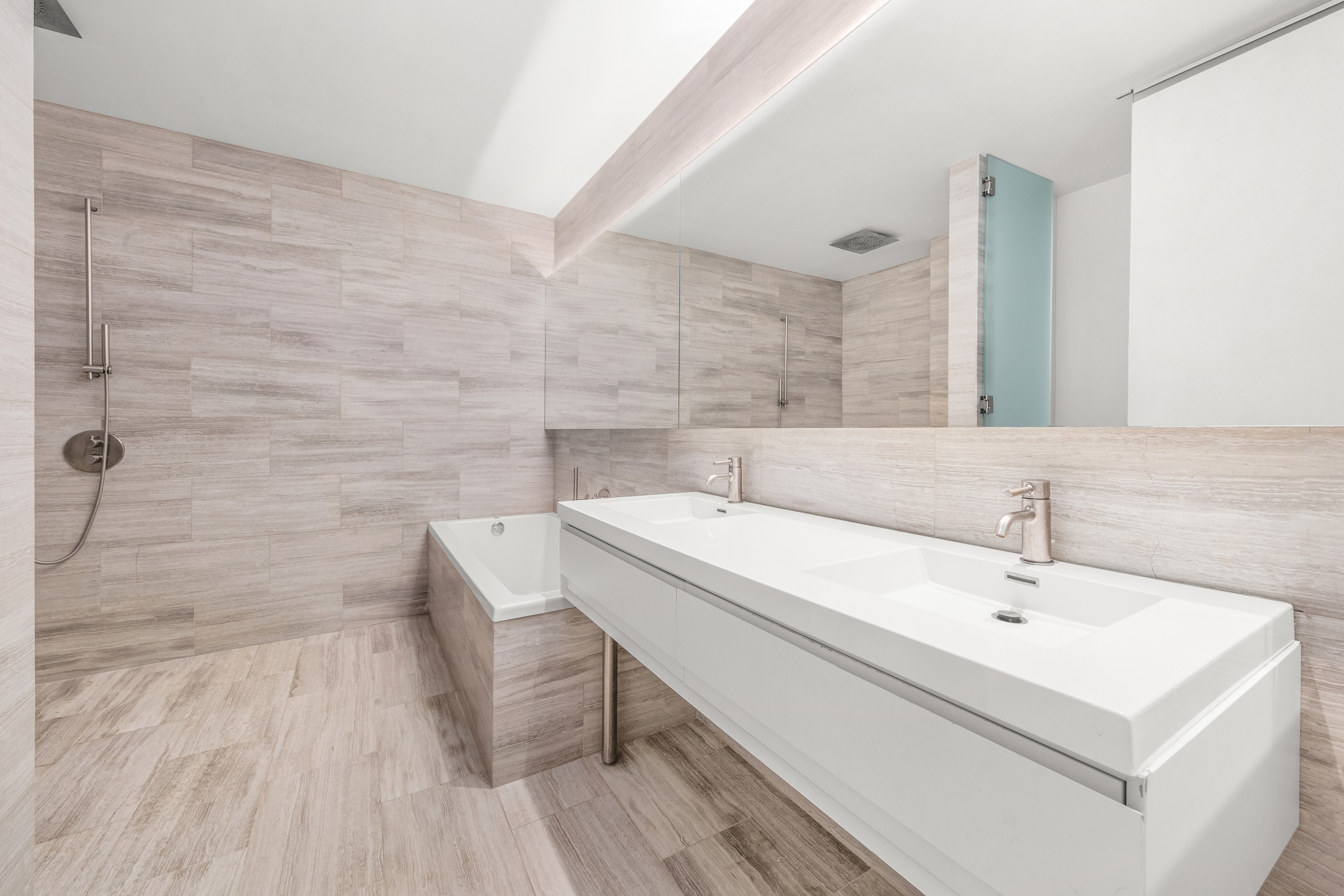 3 Wythe Lane Brooklyn, NY 11249 - Photo 15 of 30 a bathroom with a sink a toilet and mirror