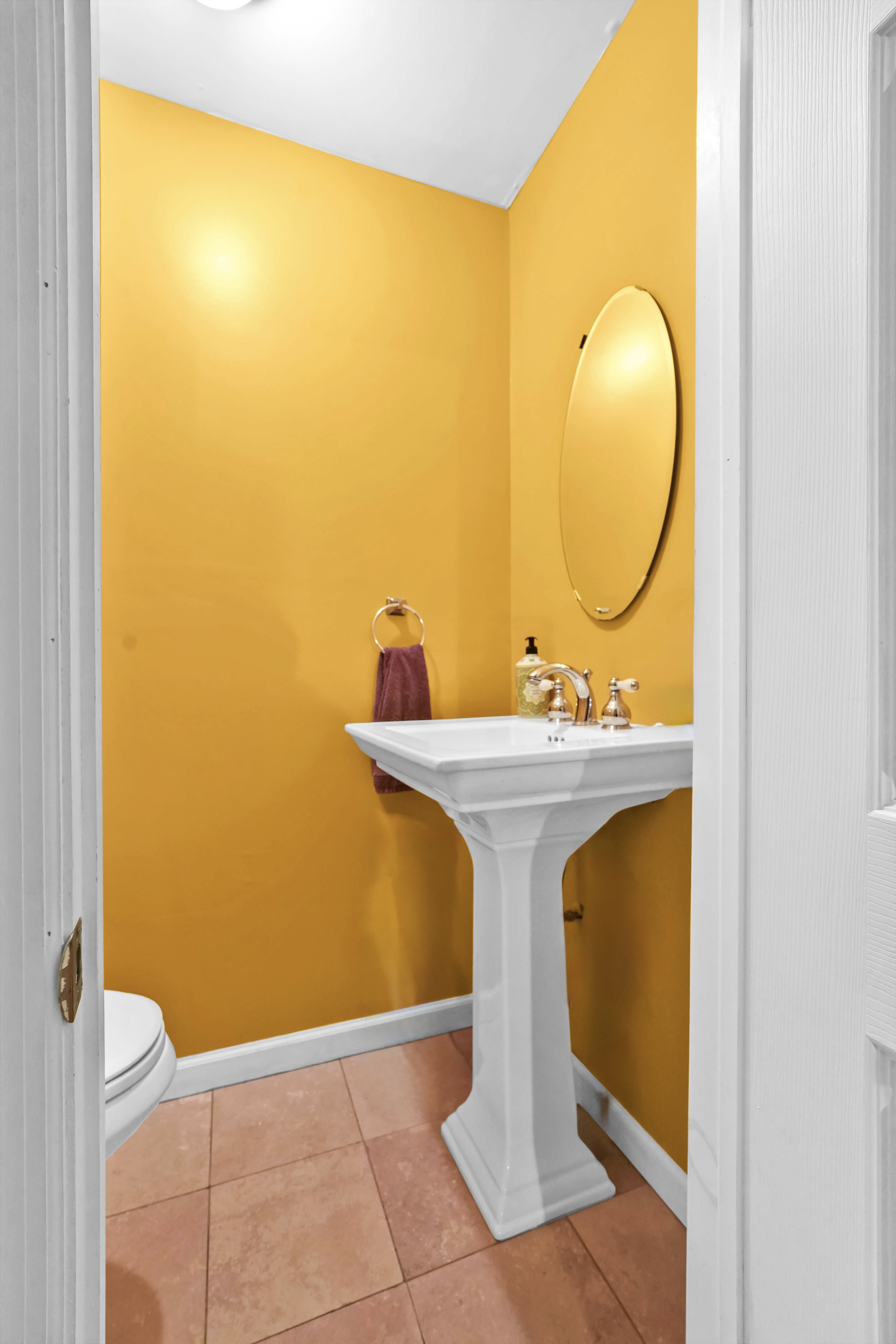 519 Monroe Street Brooklyn, NY 11221 - Photo 38 of 55 a bathroom with a sink and a mirror