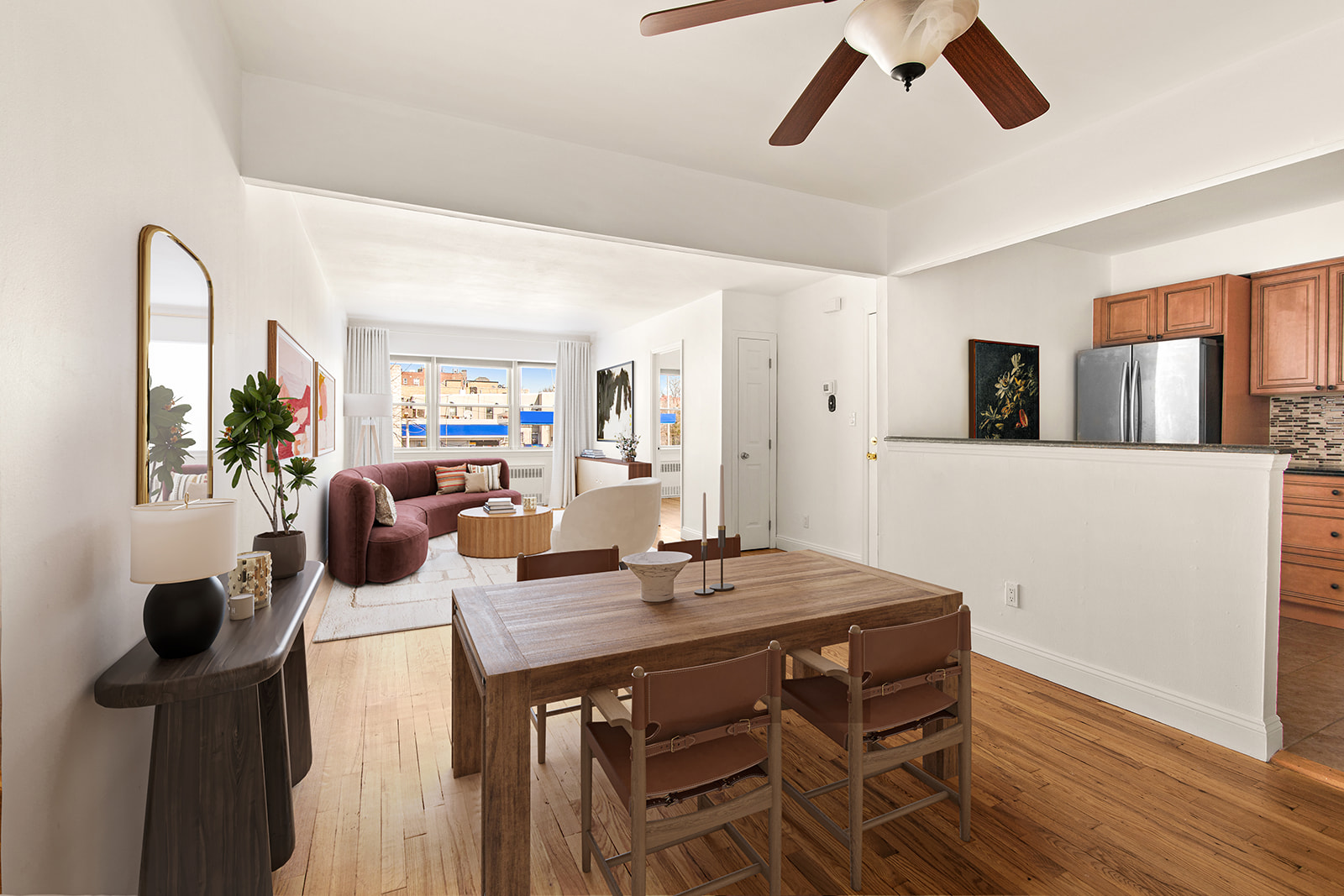 a view of a dining room with furniture and wooden floor