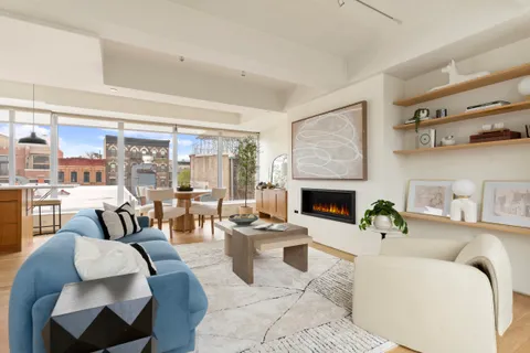 a outdoor dining space with furniture and outdoor view