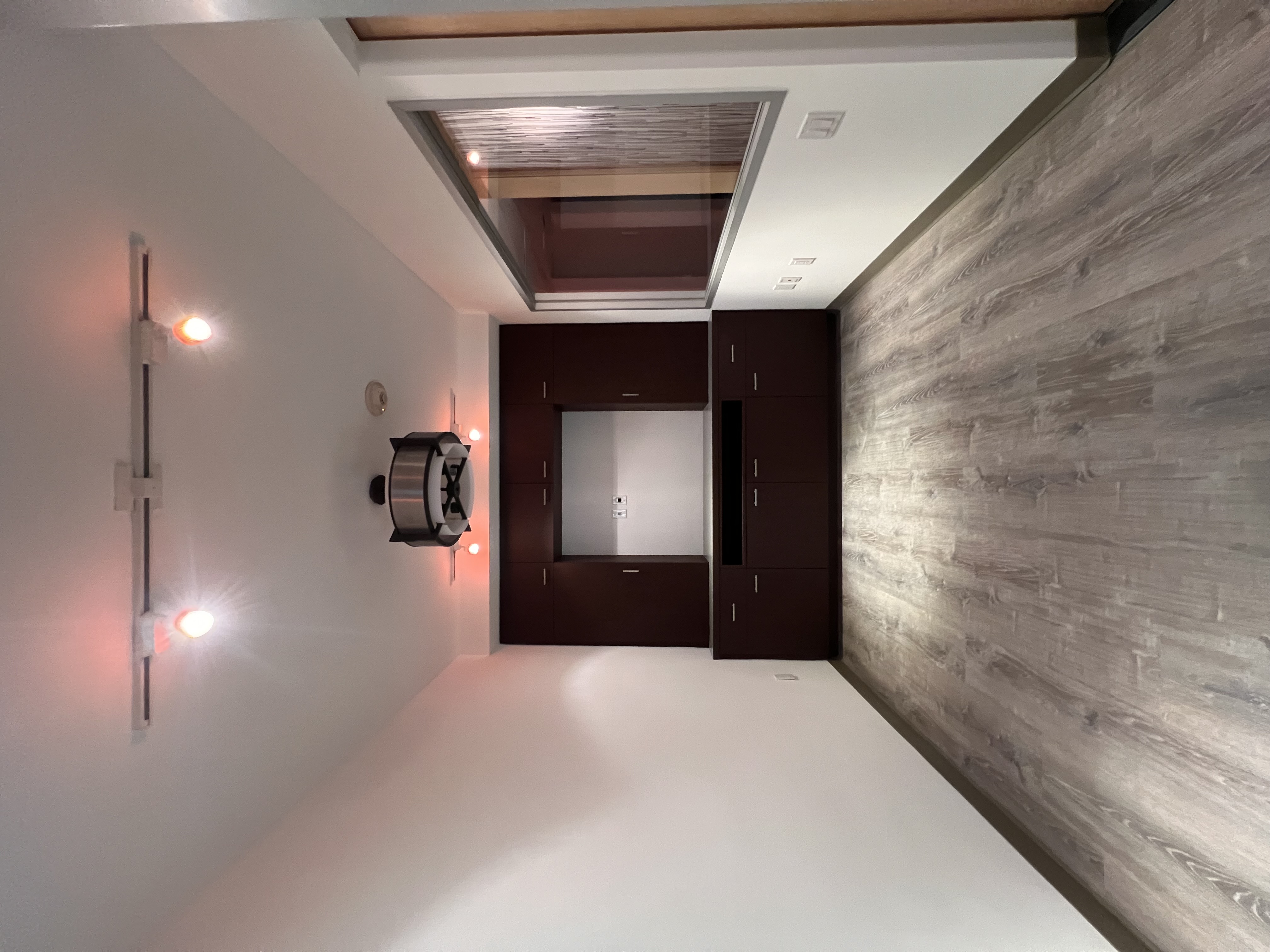 127 East 31st Street, Unit PROFESSIONAL Manhattan, NY 10016 - Photo 2 of 7 a view of a room with wooden floor