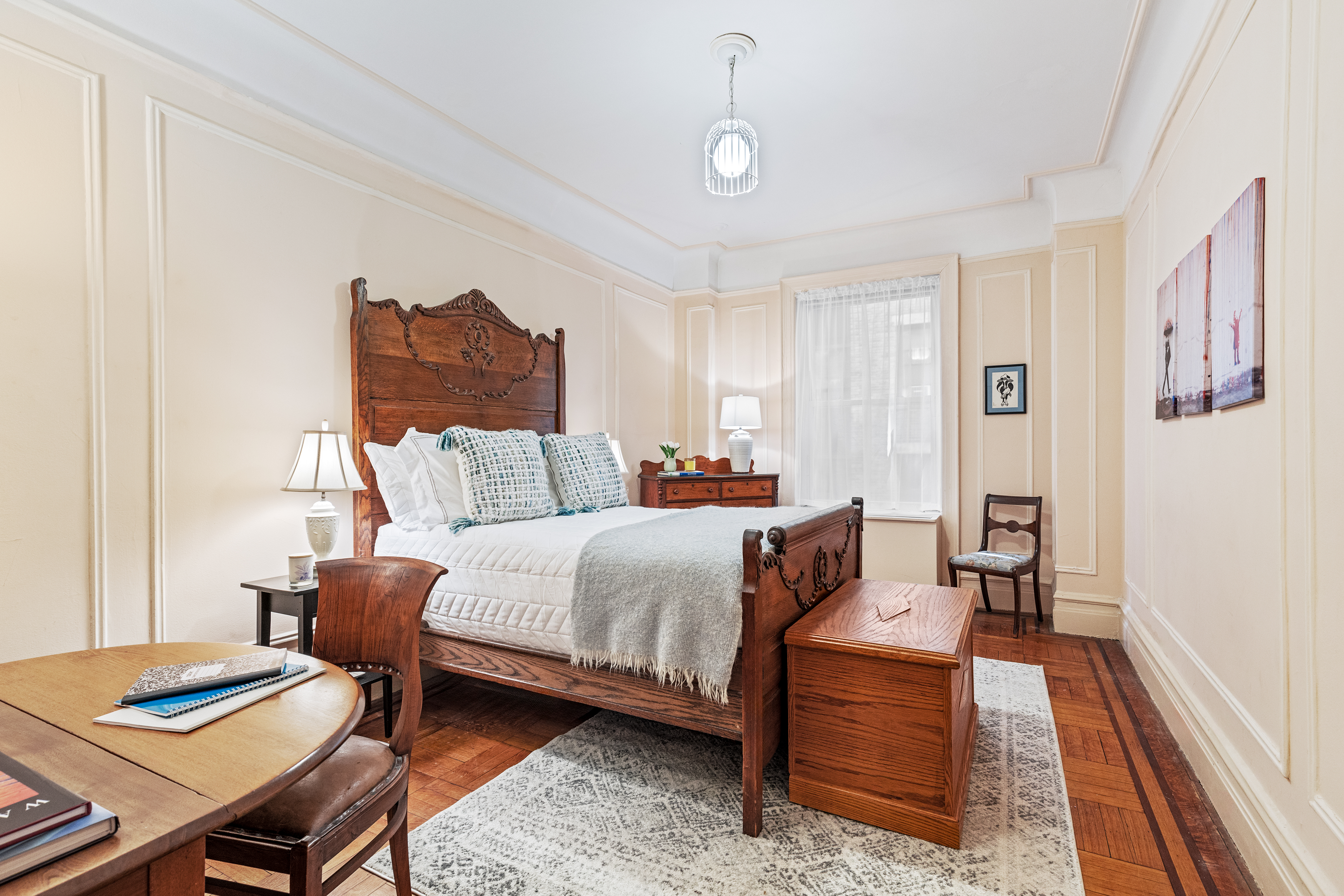 131 Riverside Drive, Unit 2C Manhattan, NY 10024 - Photo 9 of 17 a bedroom with a bed and wooden floor