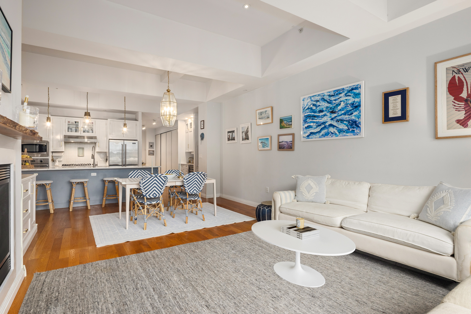 9 College Place, Unit 3A Brooklyn, NY 11201 - Photo 2 of 13 a living room with furniture and a dining table with wooden floor
