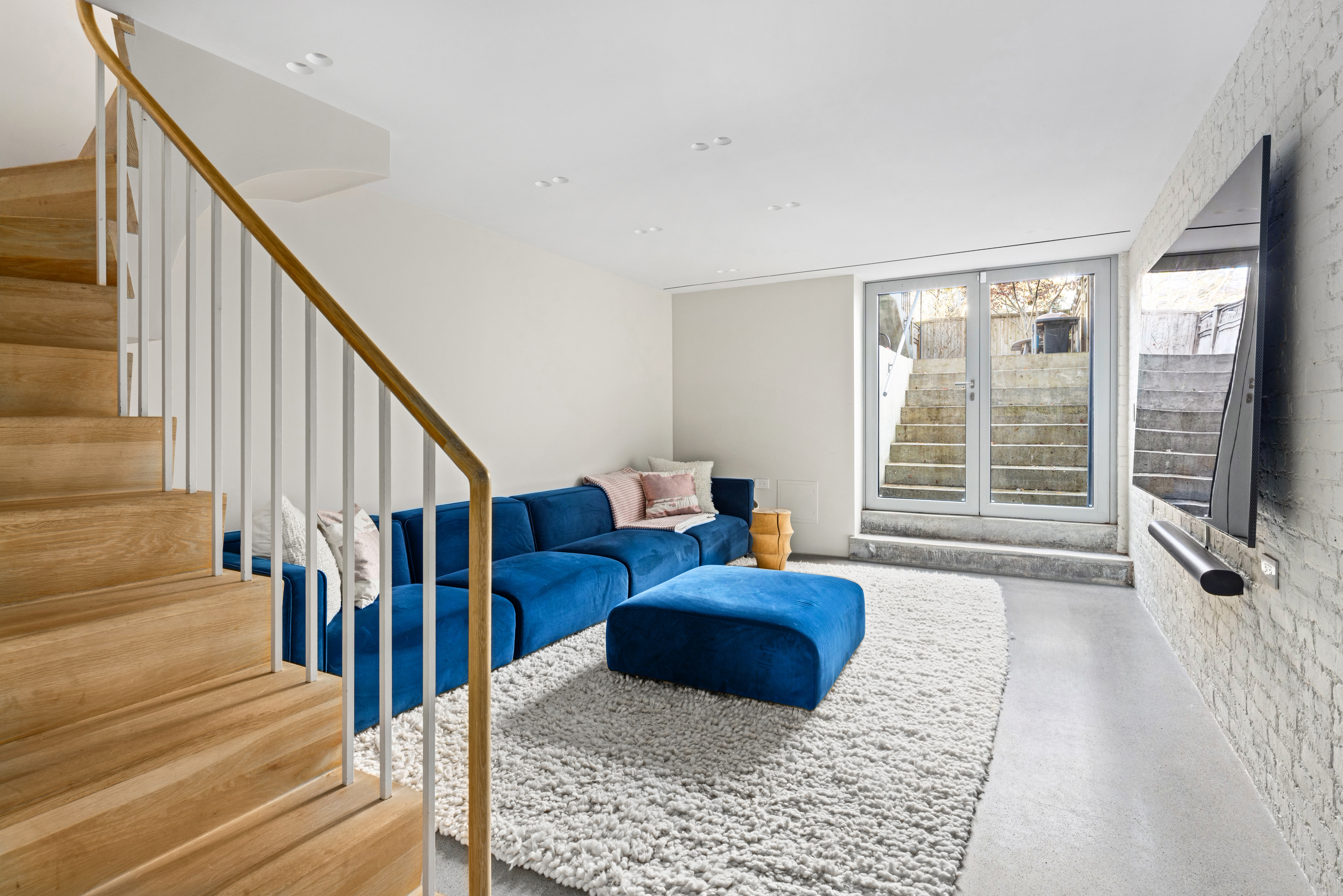 159 Hoyt Street Brooklyn, NY 11217 - Photo 12 of 18 a living room with furniture and a large window