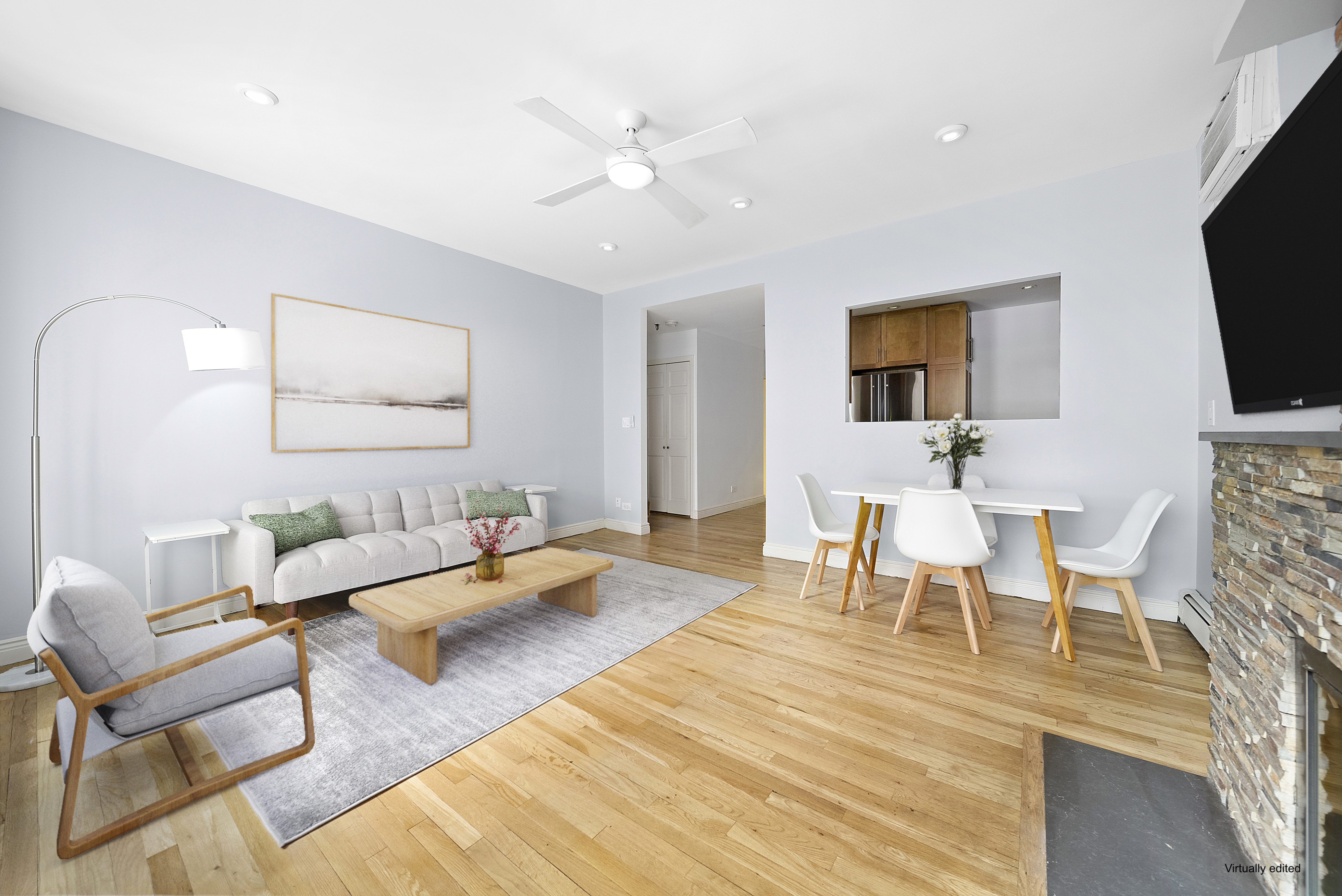 255 West 95th Street, Unit 1B Manhattan, NY 10025 - Photo 2 of 12 a living room with furniture and a flat screen tv