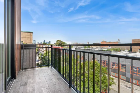 a view of city from a balcony