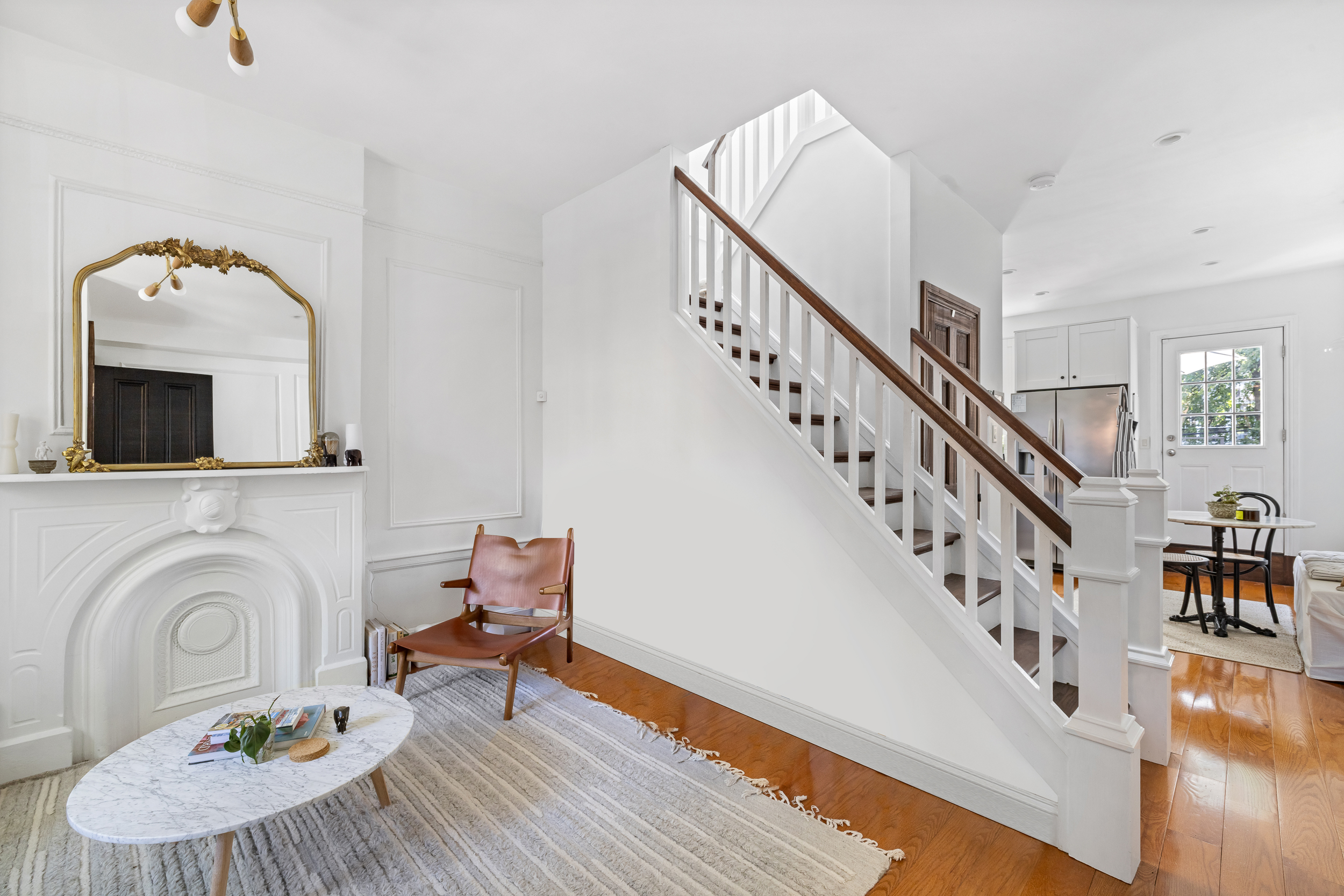 716 Monroe Street Brooklyn, NY 11221 - Photo 3 of 22 a living room with furniture and a fireplace
