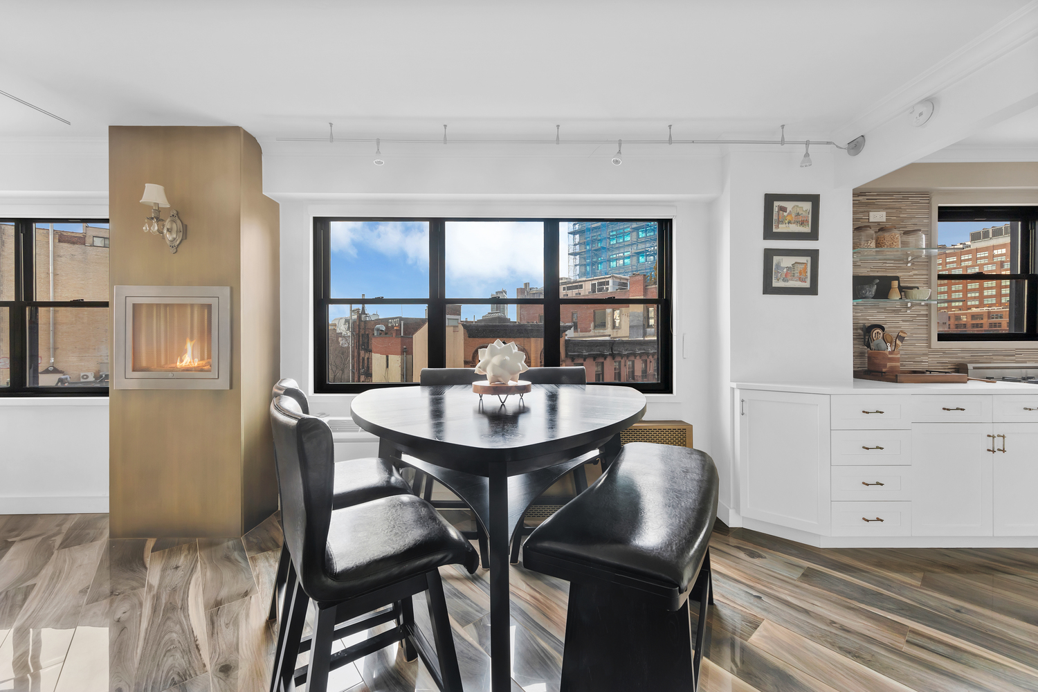 31 Jane Street, Unit 7A Manhattan, NY 10014 - Photo 3 of 11 a view of a room with furniture and window