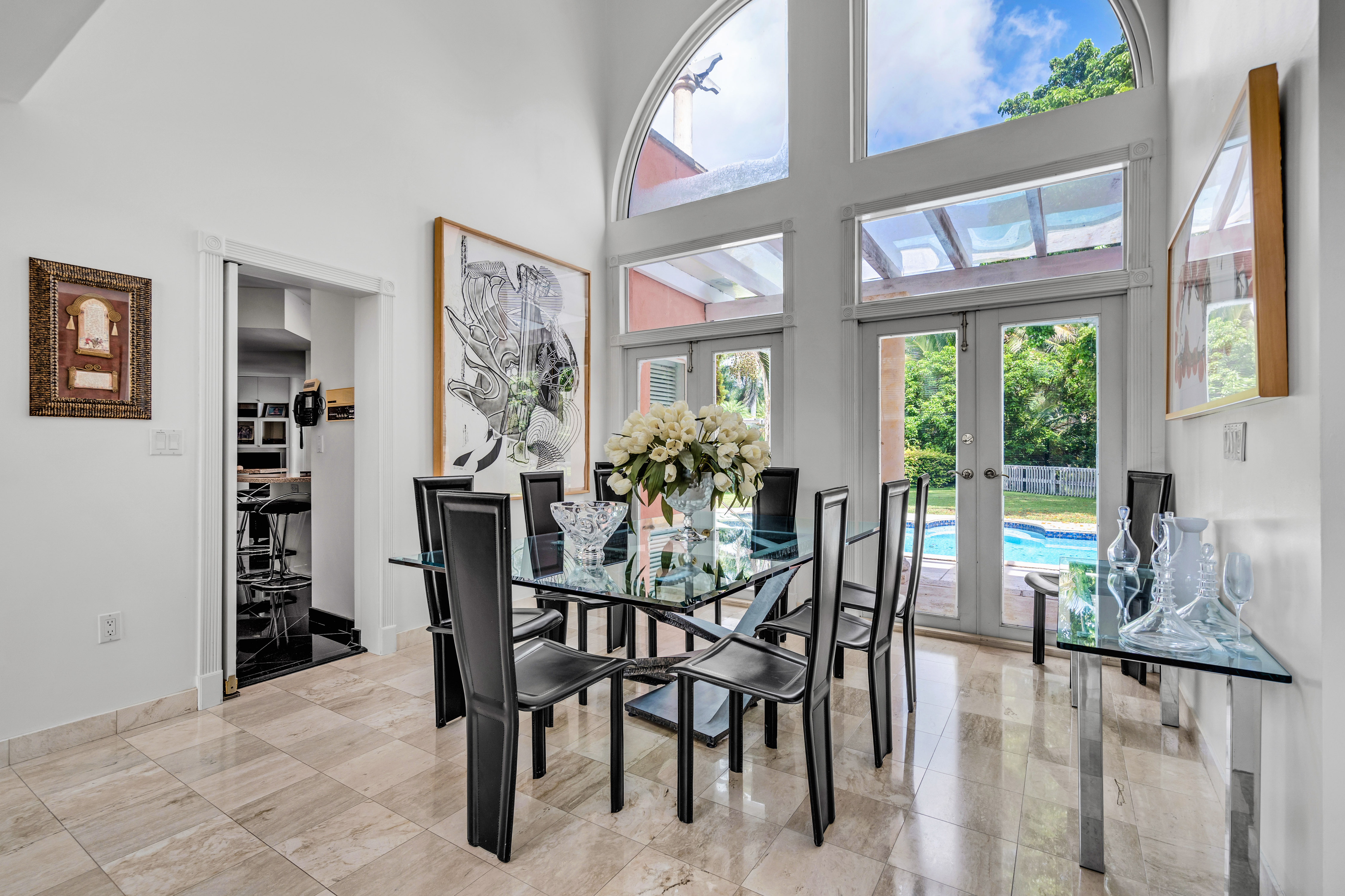 8768 Southwest 62nd Court Miami, FL 33156 - Photo 16 of 56 a view of a dining room with furniture window and outside view
