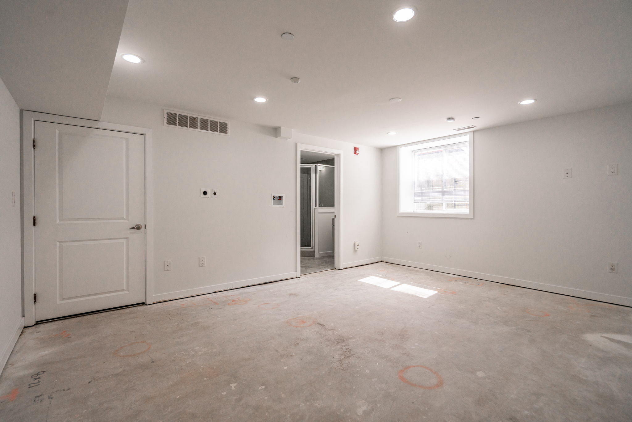 2609 Federal Street, Unit COMMERCIAL Philadelphia, PA 19146 - Photo 11 of 22 an empty room with windows and closet