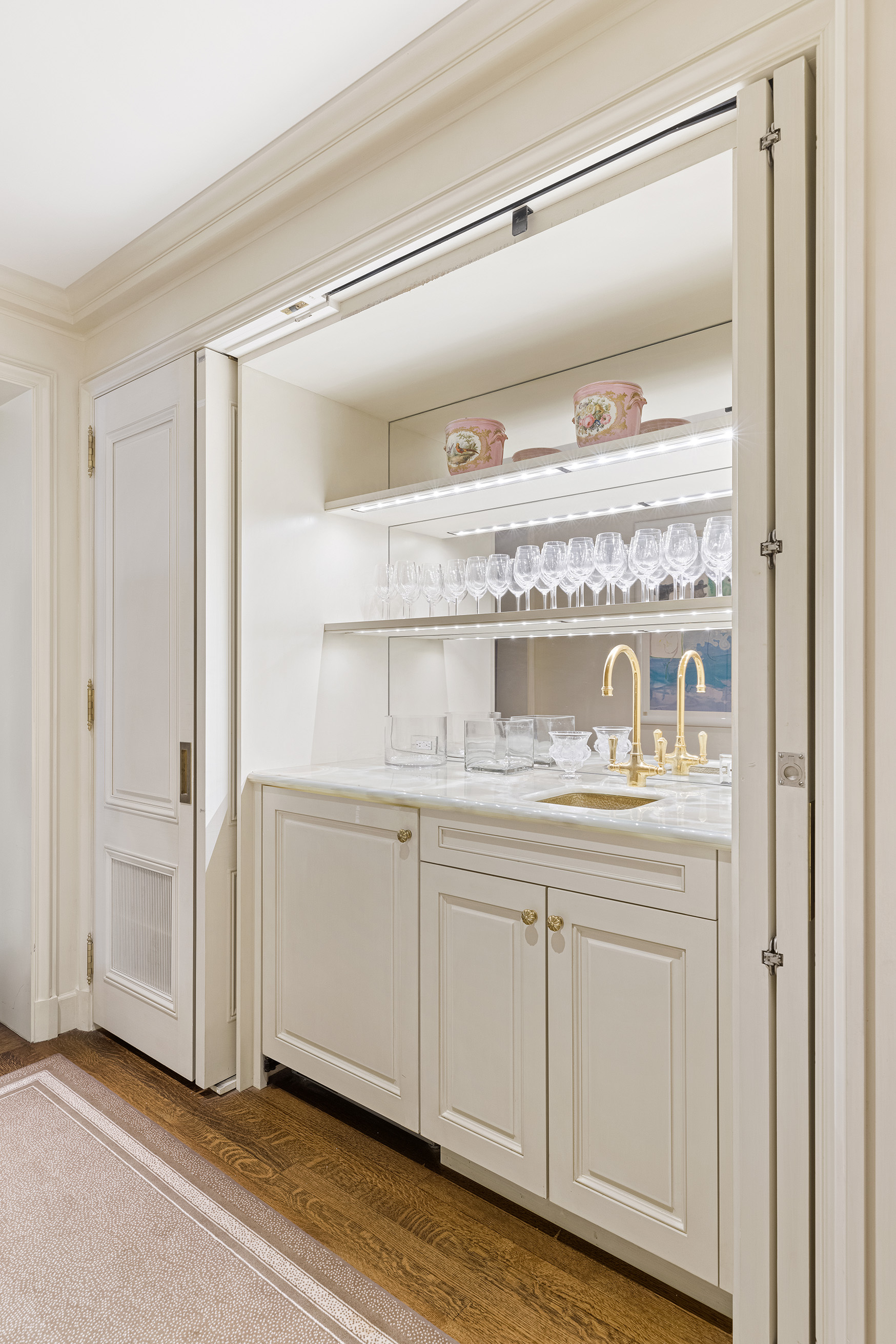 15 West 81st Street, Unit 2D Manhattan, NY 10024 - Photo 15 of 31 a view of white cabinets